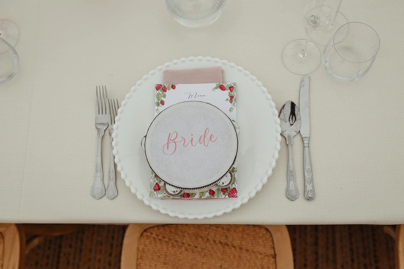 Tambourine place name with 'Bride' written in calligraphy