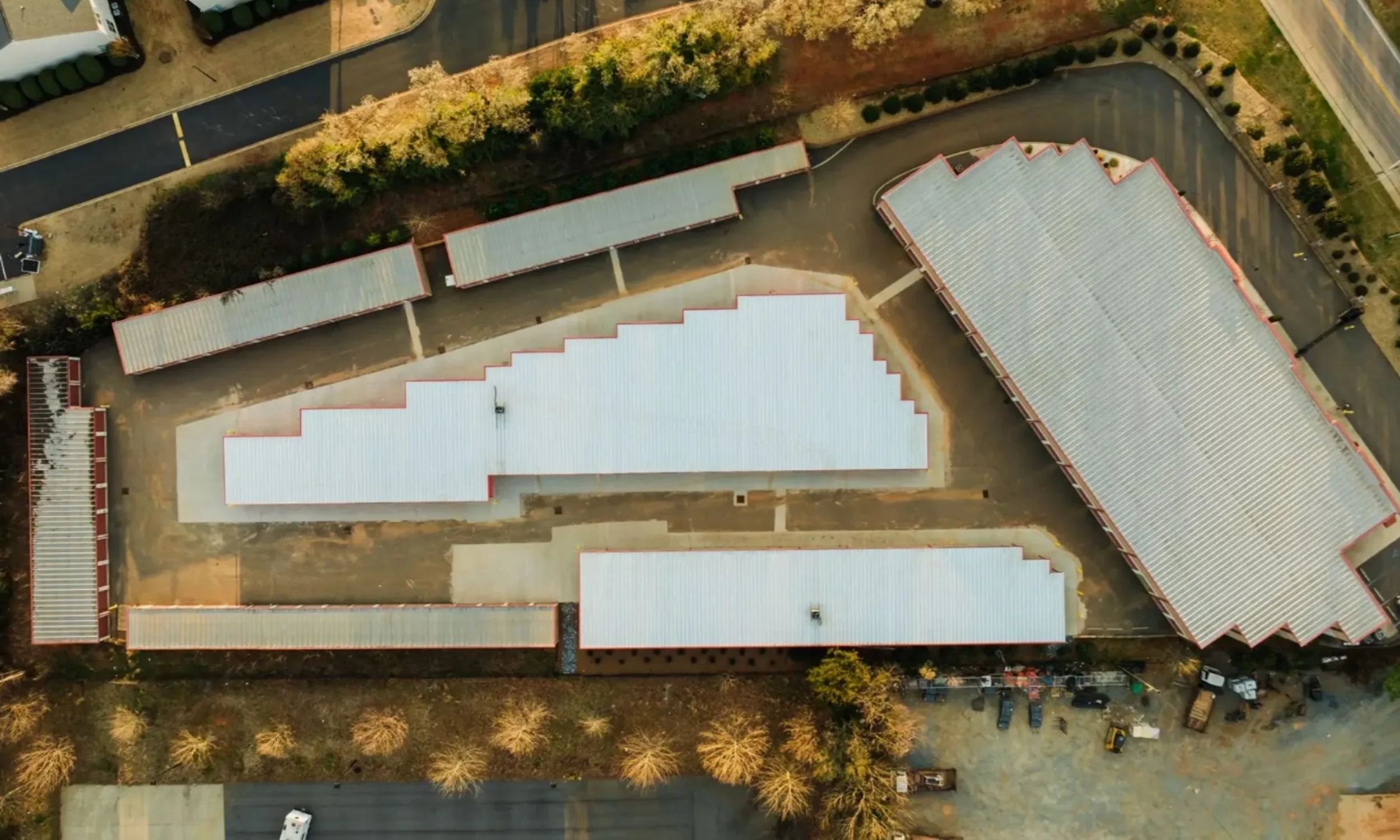 Overhead view of commercial self-storage site planning in Wilmington NC by LAT34 Architecture showing multiple buildings and drive aisles.