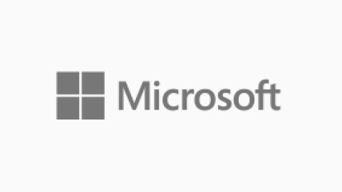 Microsoft logo with four squares arranged in a 2x2 grid and the word 'Microsoft' next to it.