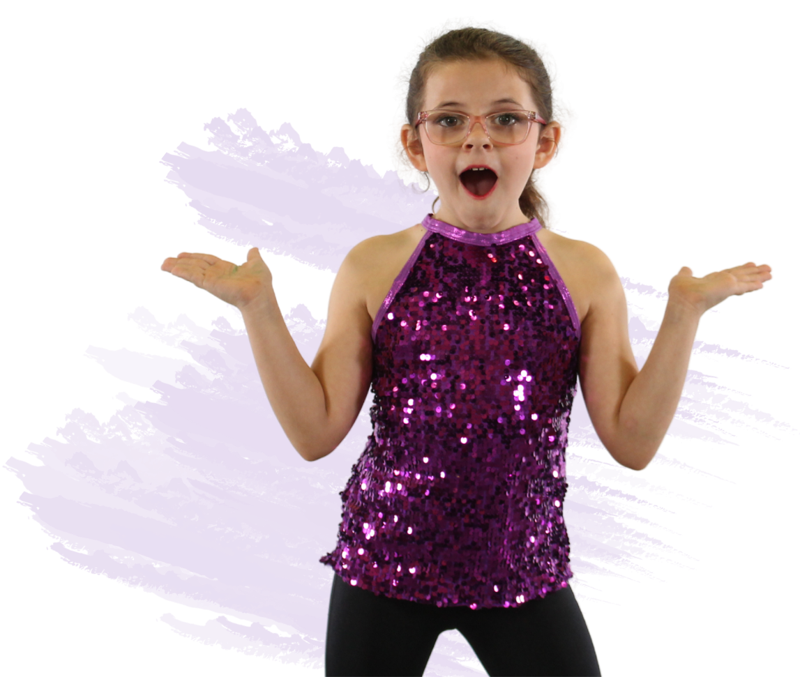 Surprised young girl in a purple sequin top and glasses with arms outstretched in front of a purple painted backdrop.