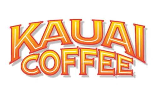 Kauai Coffee logo in bold red, orange, yellow, and white text