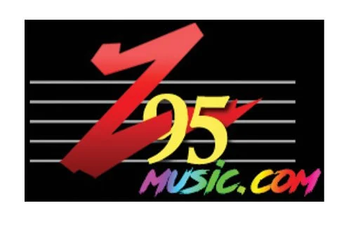 Logo for  Z-25 Music.com with a red and yellow Z, the number 25, and the text 'music.com' in purple, green, and red on a black background.