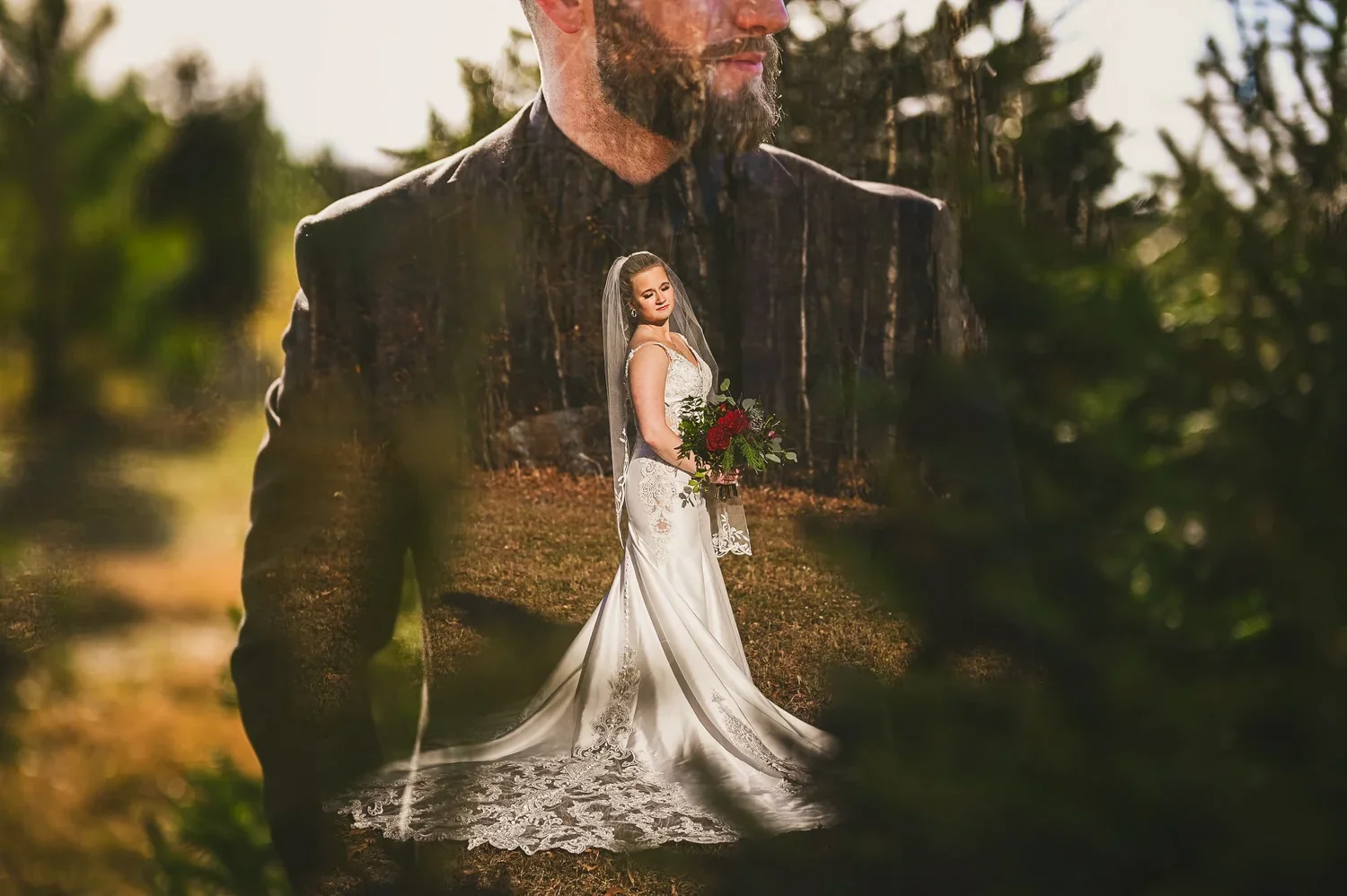 Double exposure wedding portrait of a bride and groom wearing wedding attire on their wedding day with nature in the background.