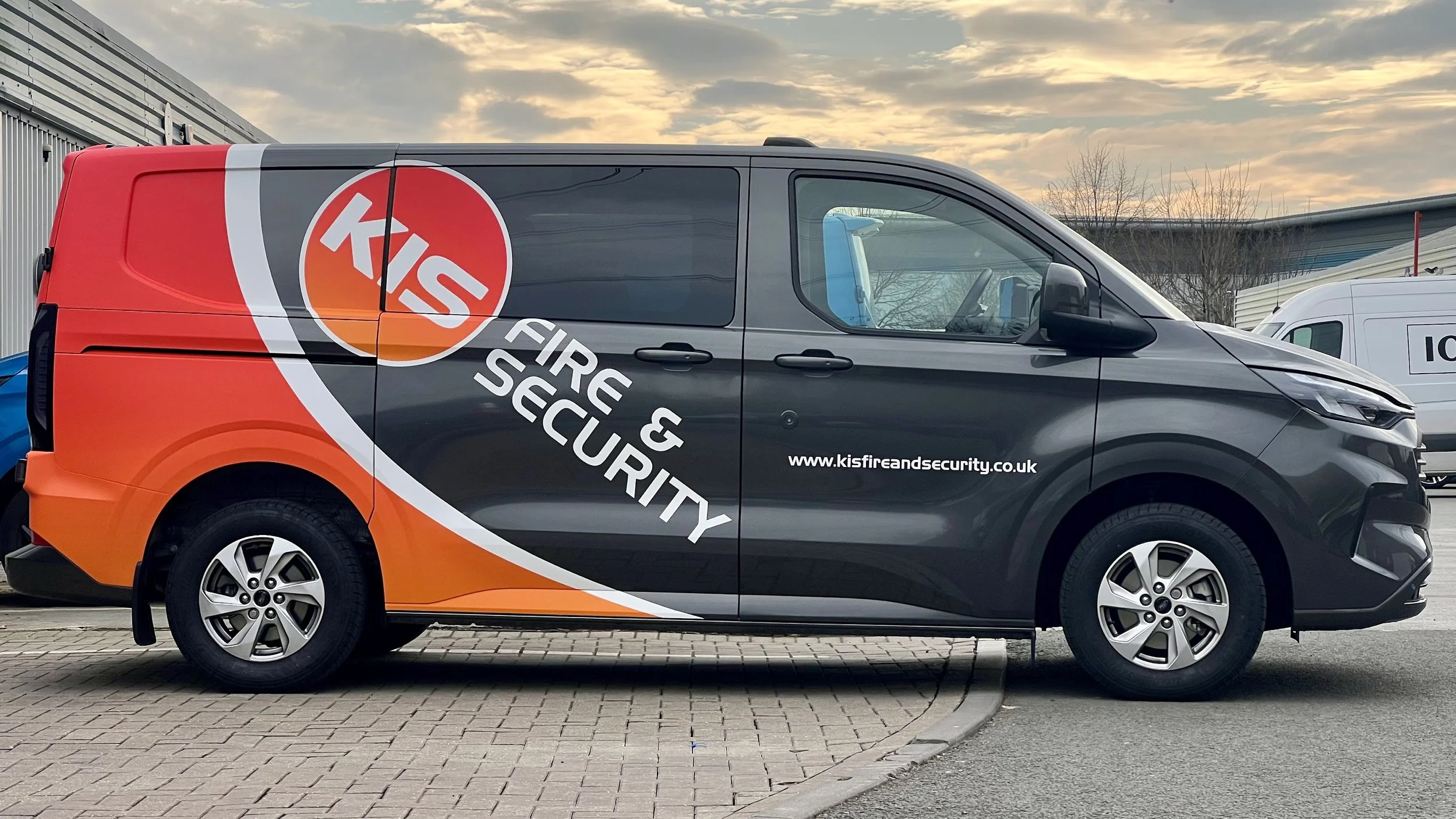 Digitally printed partial van wrap on a transit custom
