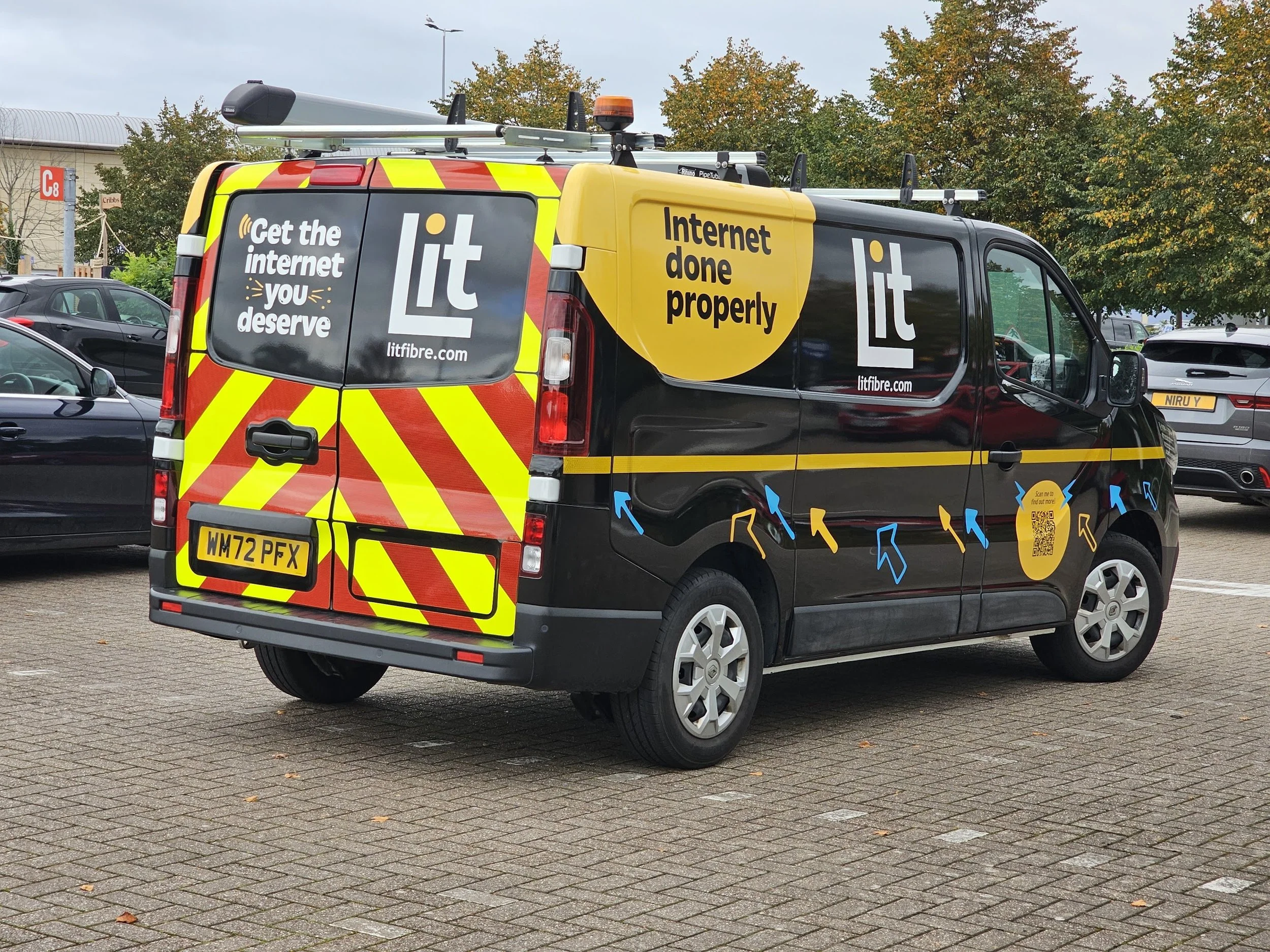Full colour change van wrap with cut vinyl graphics and rear reflective chevrons for Lit Fibre