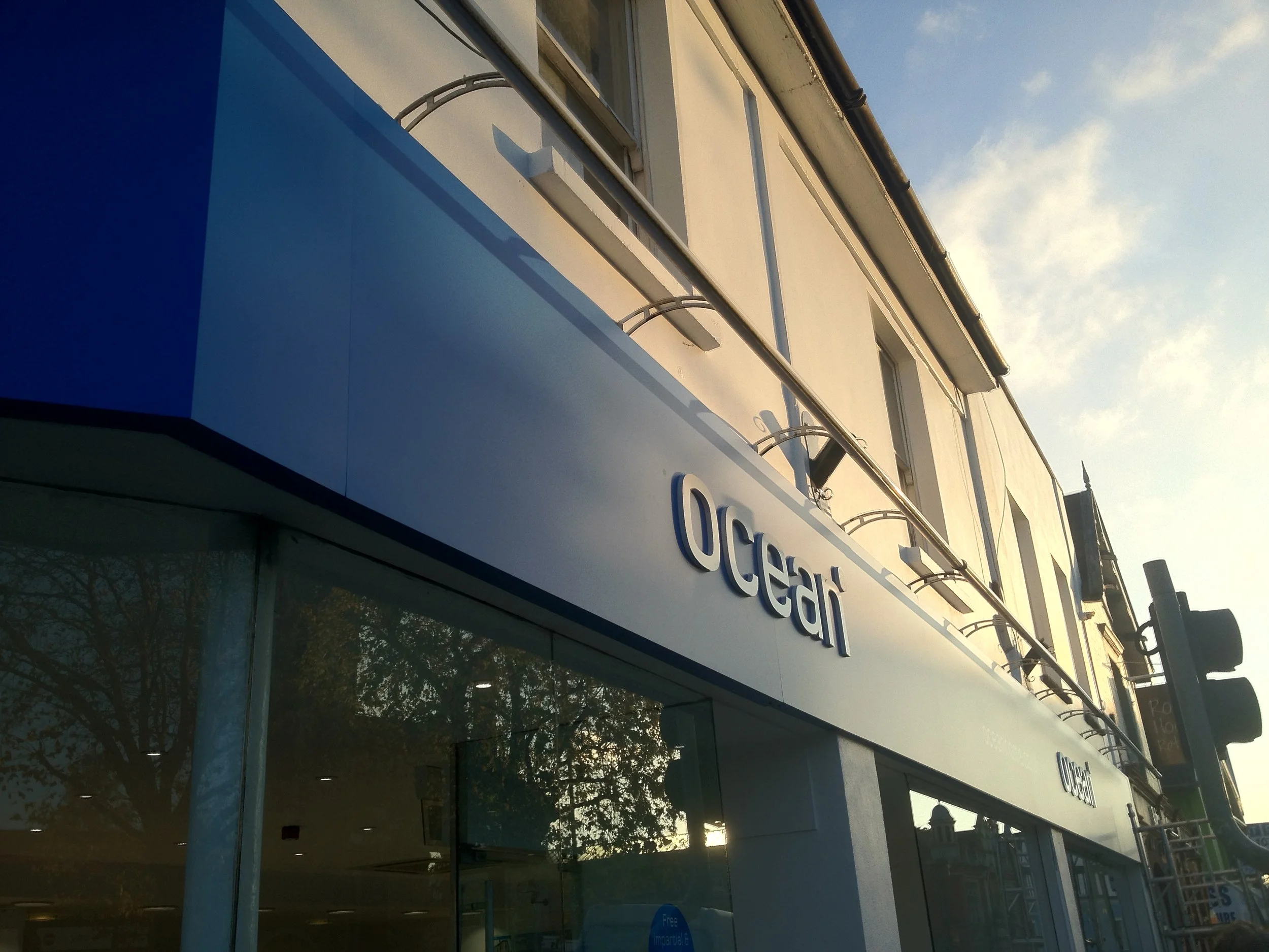 Exterior of a building with a sign that ocean in 3d built up letters. 
