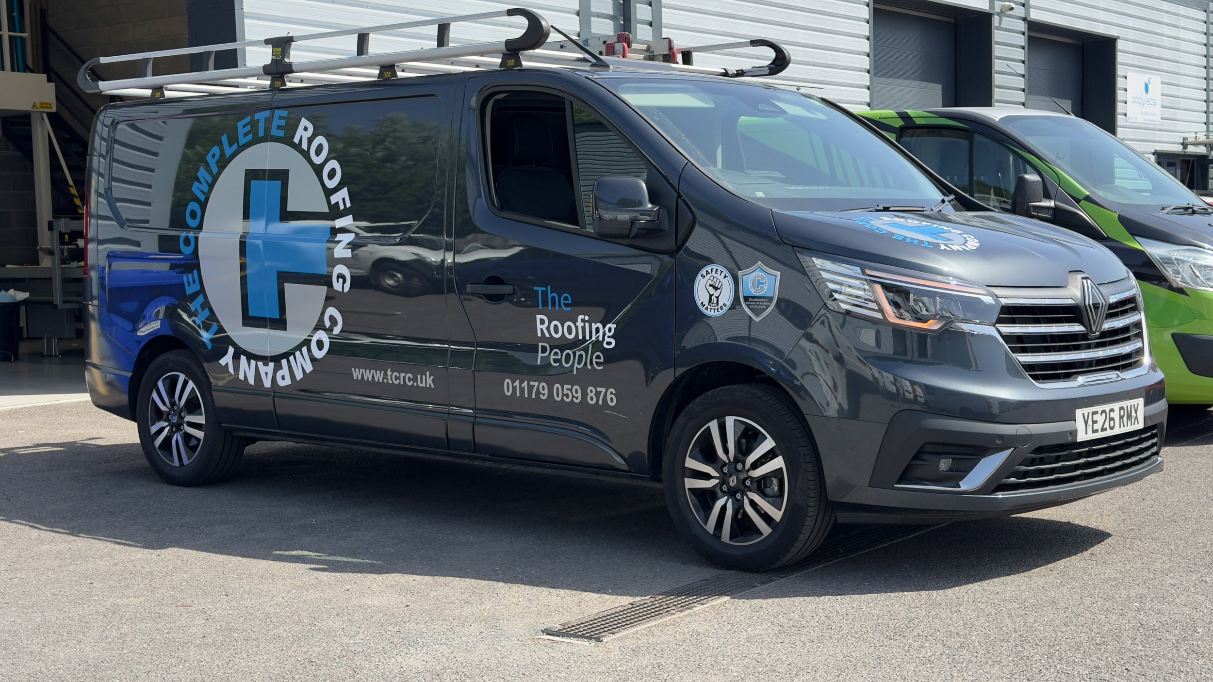 Van with commercial vehicle graphics parked outside of zest graphics installation centre