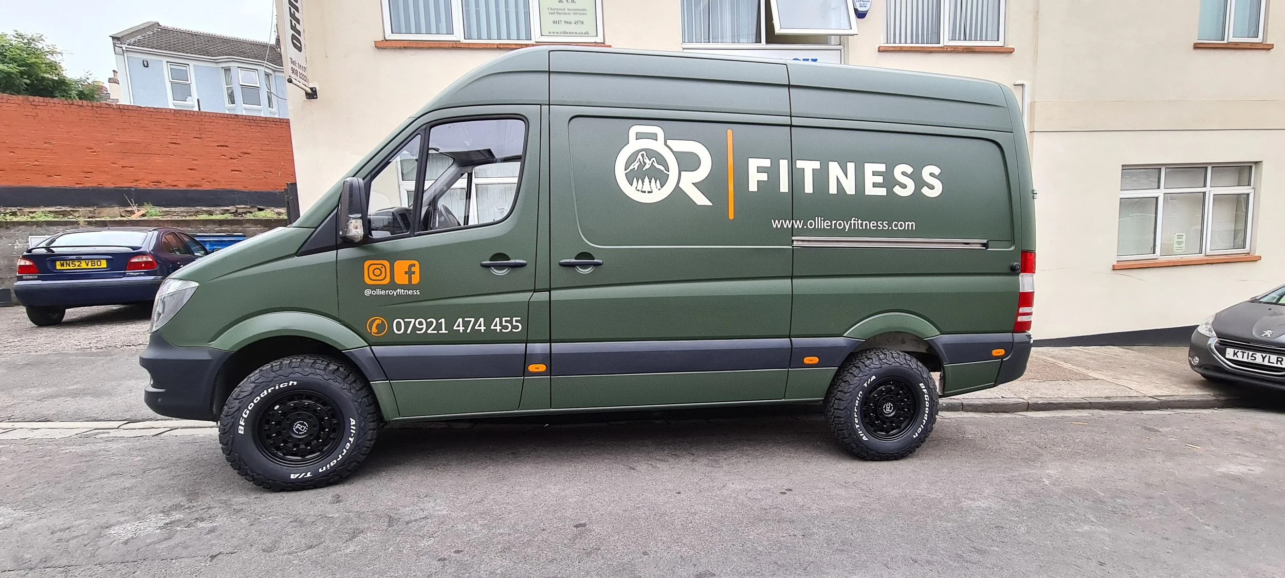 matte green Van wrap with graphics