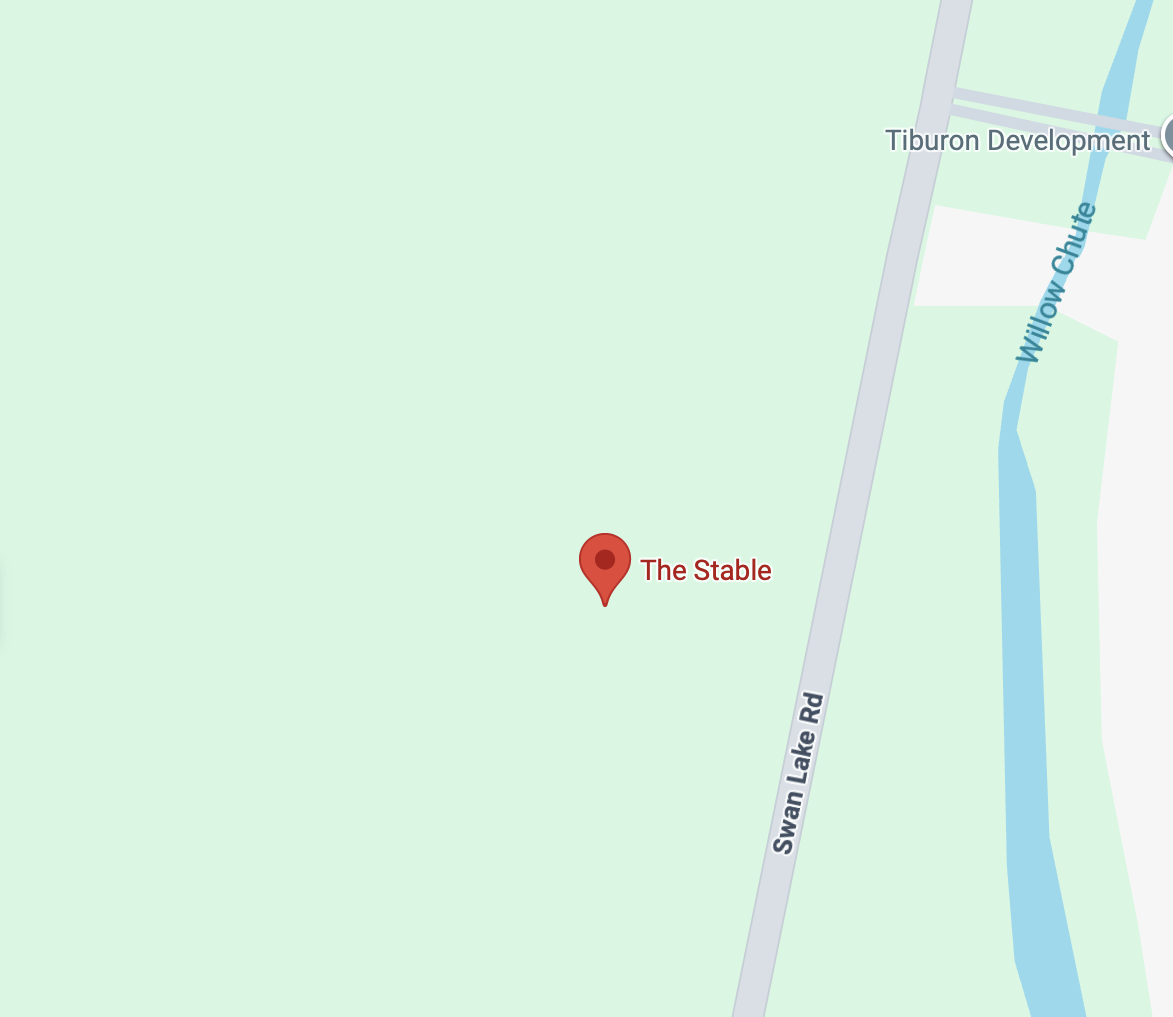 Map showing a location near Swan Lake Road and Willow Chute Creek, with a marker labeled 'The Stable' and nearby features including Tiburon Development.