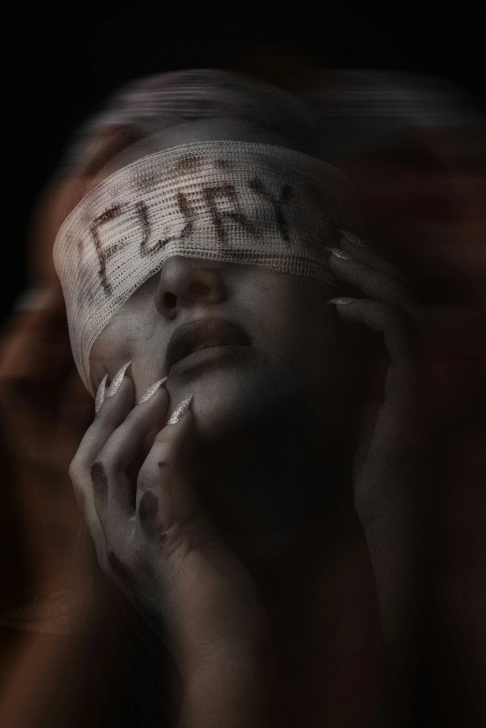 Woman with a bandage reading "Fury" over her eyes, symbolizing the pain and anger of narcissistic abuse