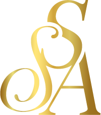 Golden statue or award resembling a figure with arms raised, with a rounded top.