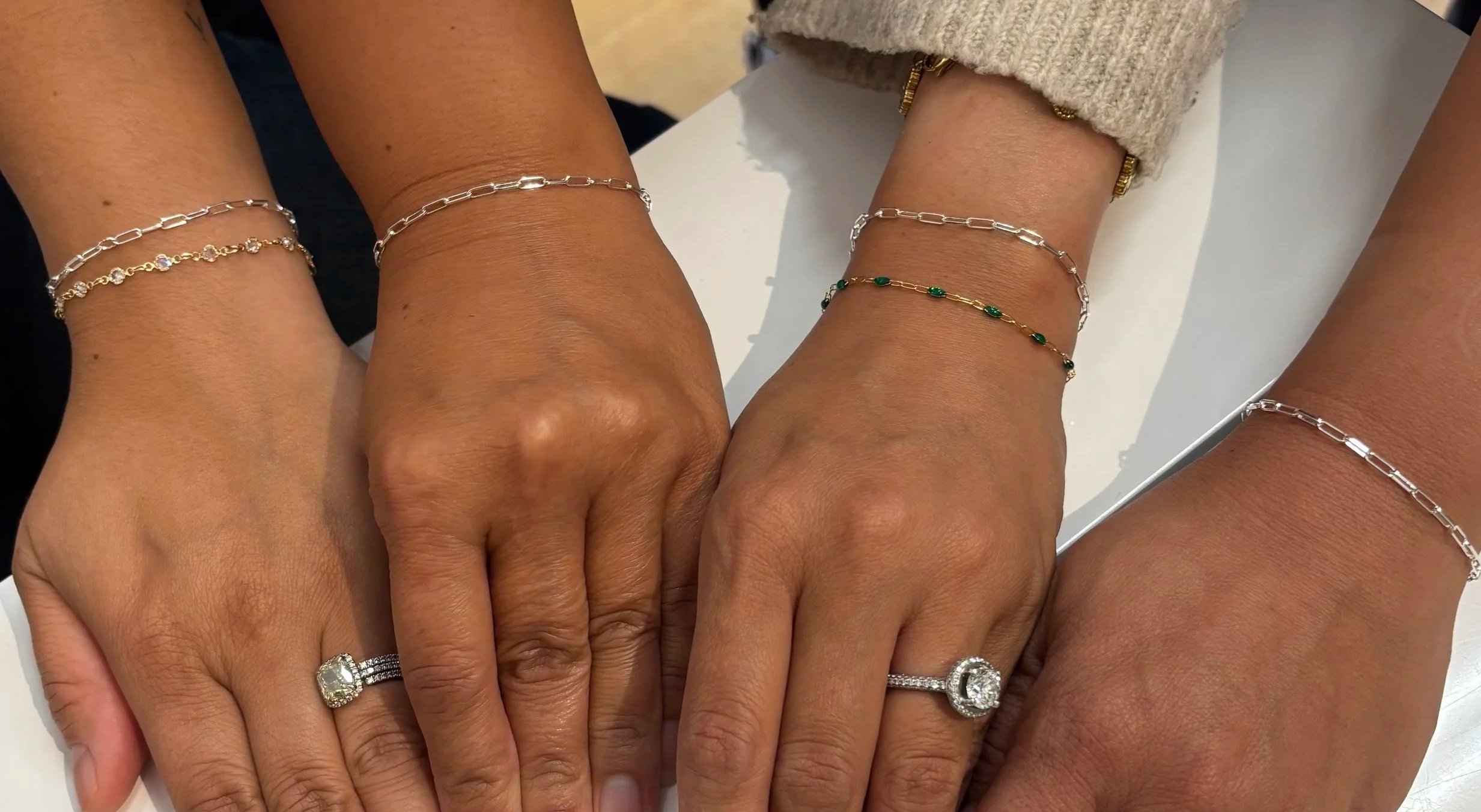 permanent jewelry bracelets from a group of friends who came to Amy's Jewelry Box.