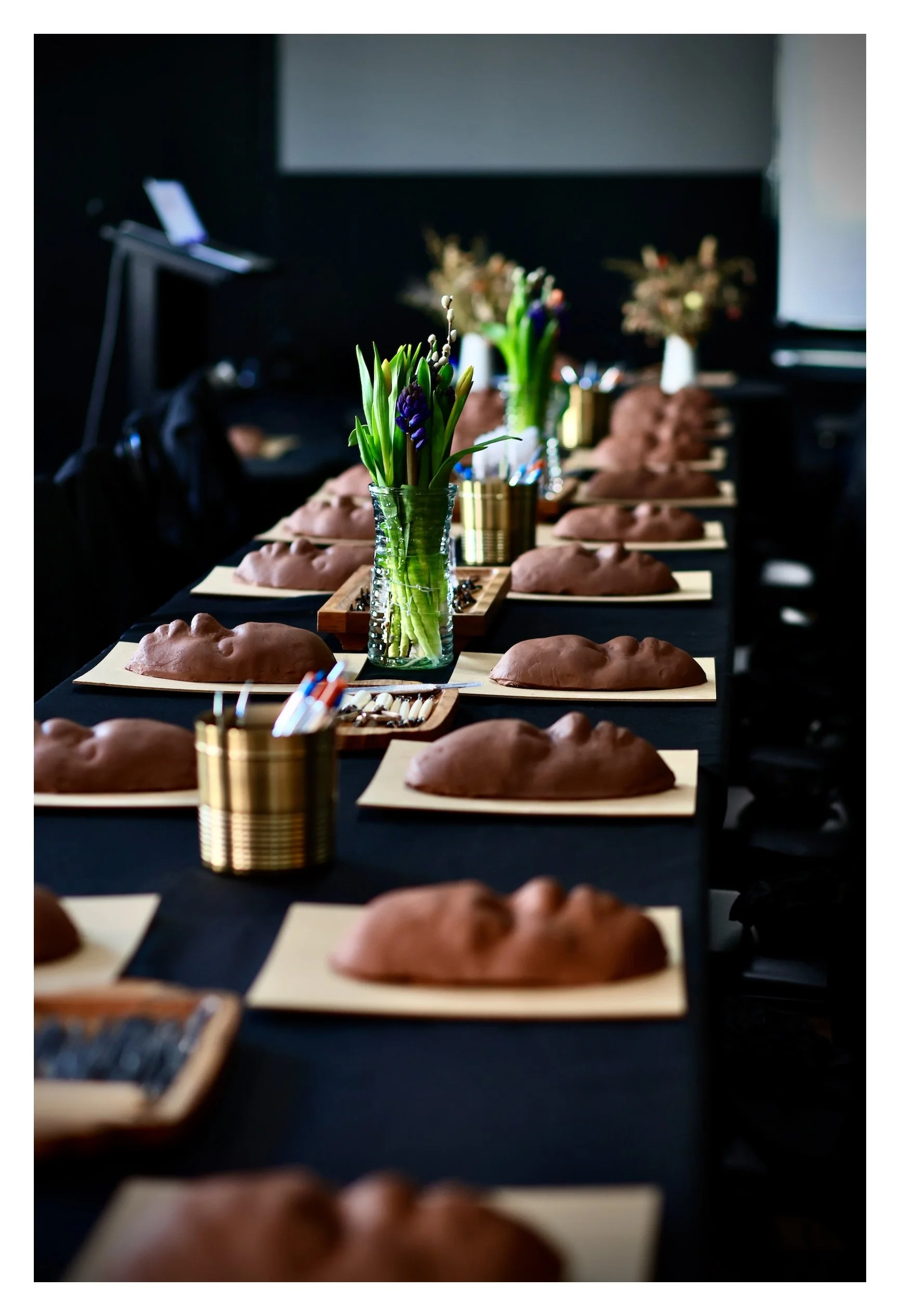 A conference room with a long table