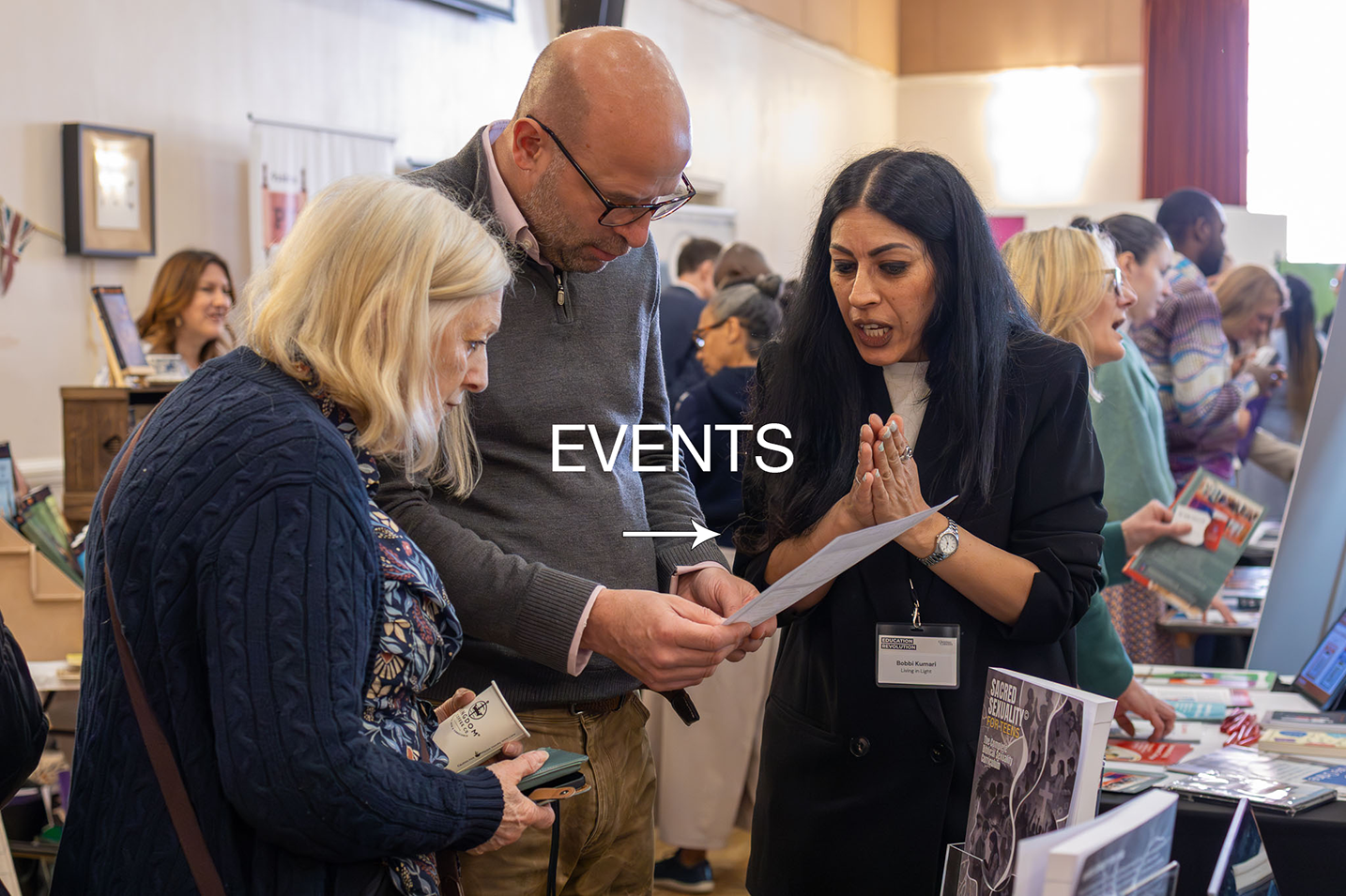 Delegates interacting and exhibiting at a Christian event.