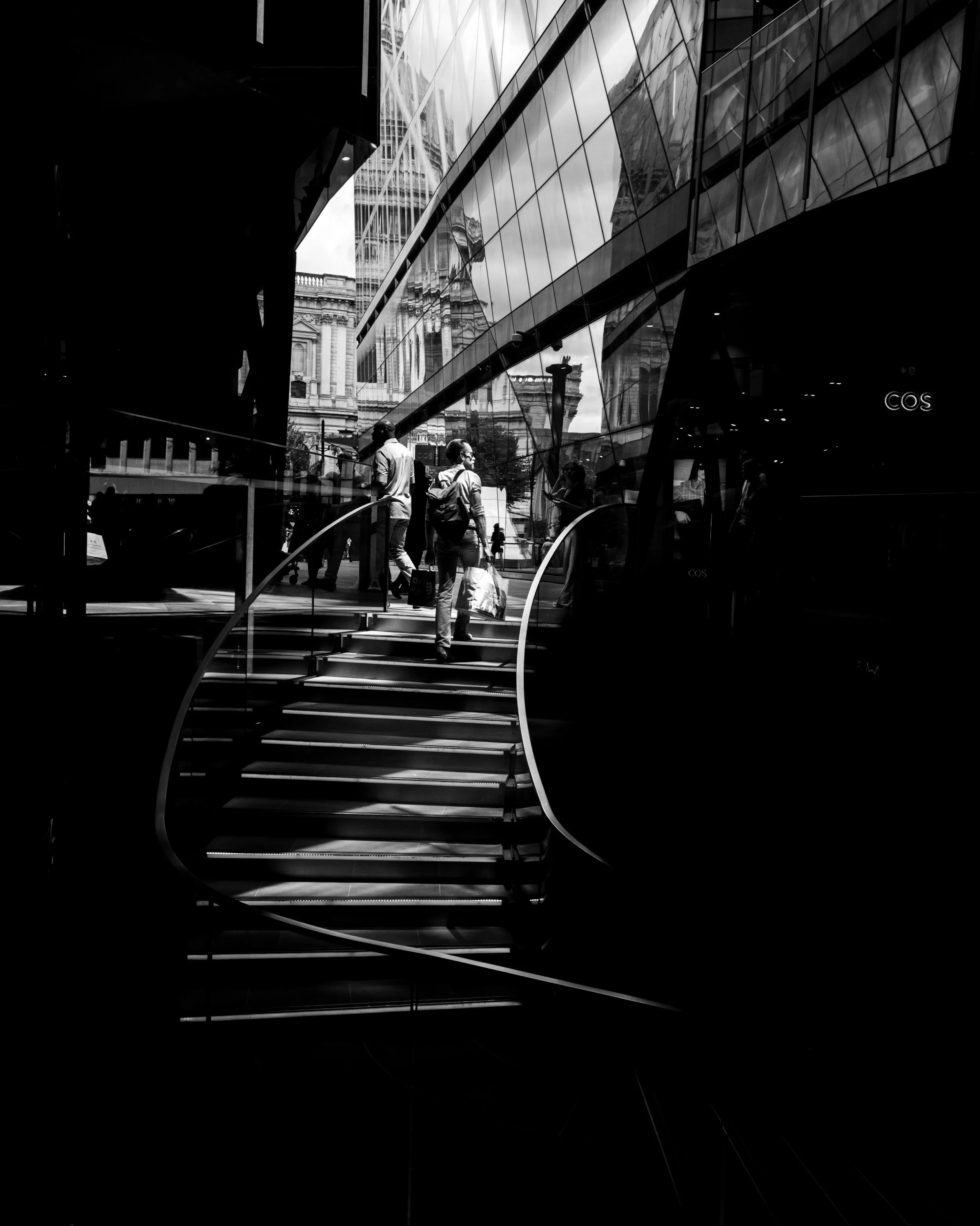 Walking through One New Change felt like stepping into a black and white movie.

I spent the afternoon slowing down and experimenting with reflections, motion, geometry and the way people move through the space.

It&rsquo;s funny how removing colour 