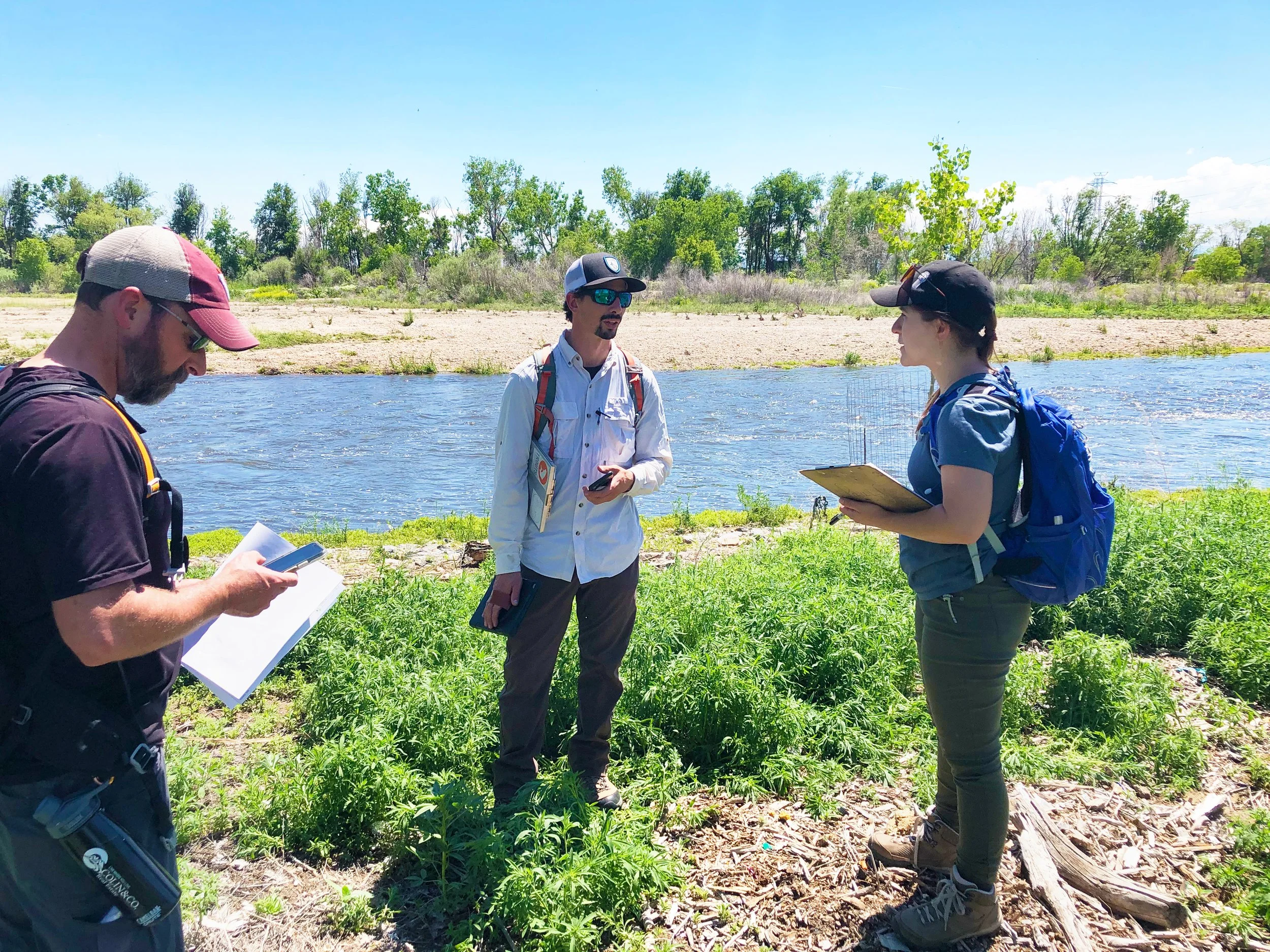 Environmental scientists and surveyors studying the El Paso County Stormwater Drainage