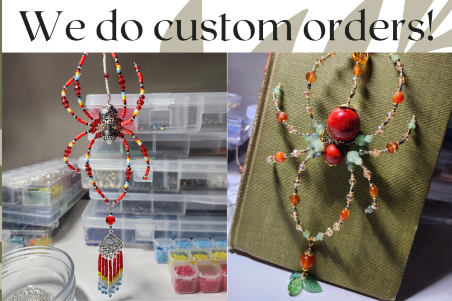 Two beaded spiders on a workspace and a green book, all featuring intricate beadwork with colorful beads.