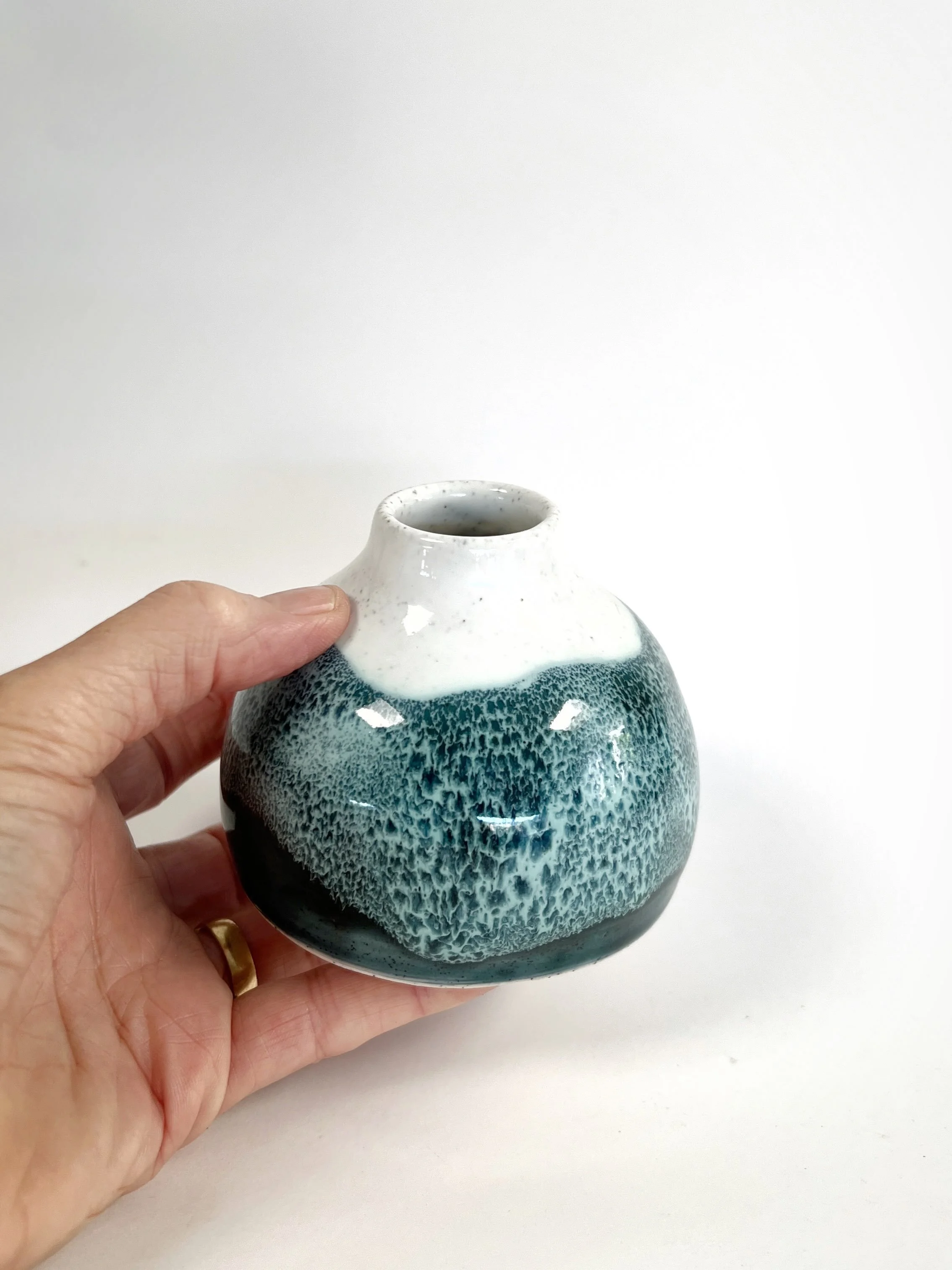 A small vase with big ocean energy! 🌊 Nature is always my starting point for my work, form, colour, and texture. Swipe to see the inspiration for this glaze. 💙  #handmadeceramics #wheelthrownpottery #pottery 
#australianceramics #jacpots