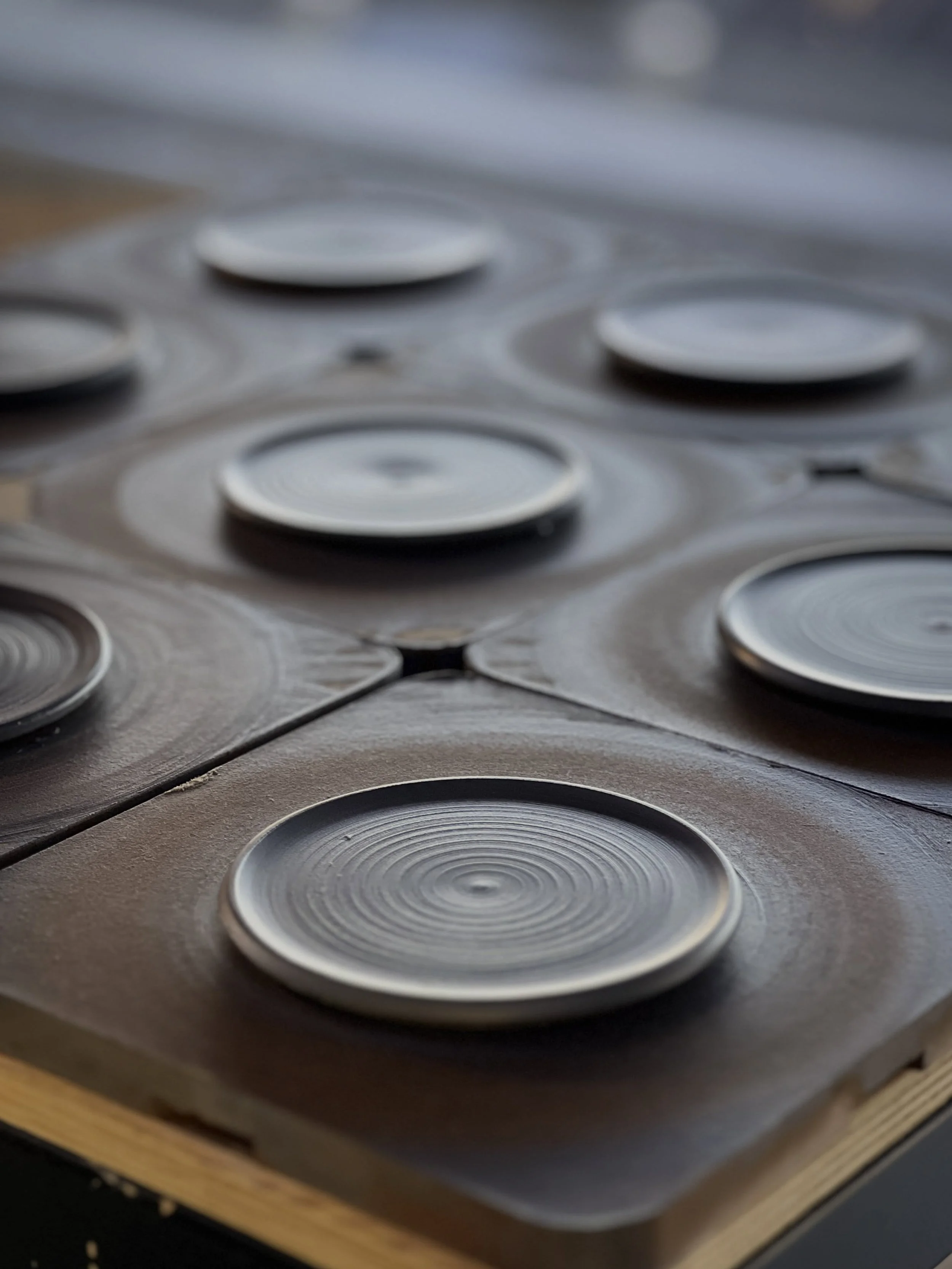 Plot twist🌀 These started life as glaze test tiles, small batches for testing dinnerware safe combinations, but somewhere between throwing and firing, I realised these little discs were perfect as they are! 🖤 Say hello to a new range of JacPots coa