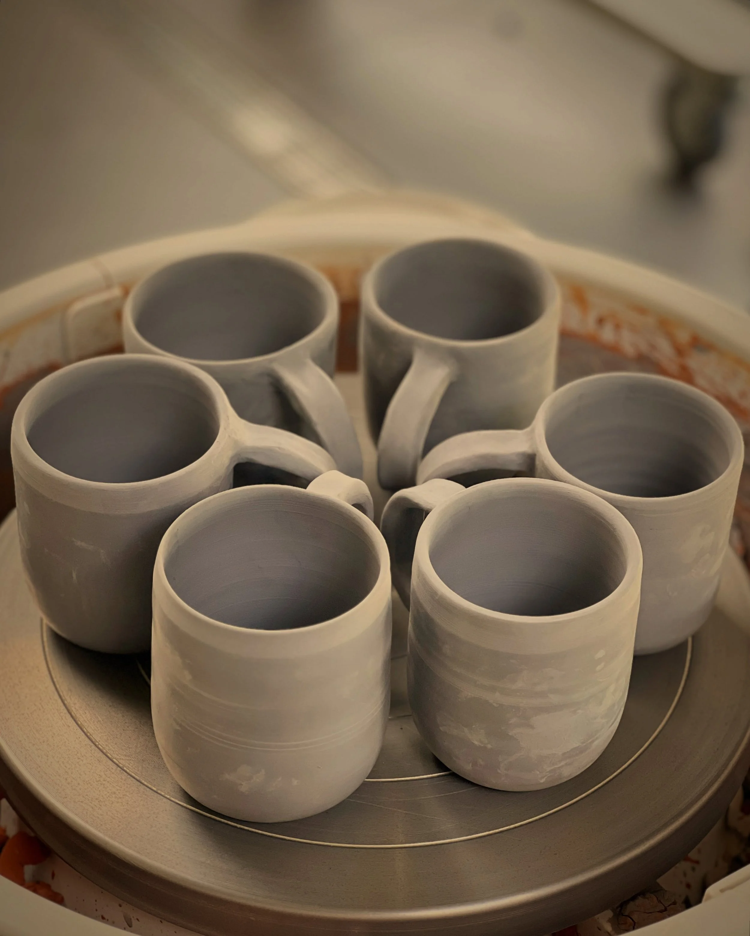 Mugs for days! ☕️ This little lot are currently in the kiln for their bisque firing! Now just need to think about how to glaze them! 🧑&zwj;🎨