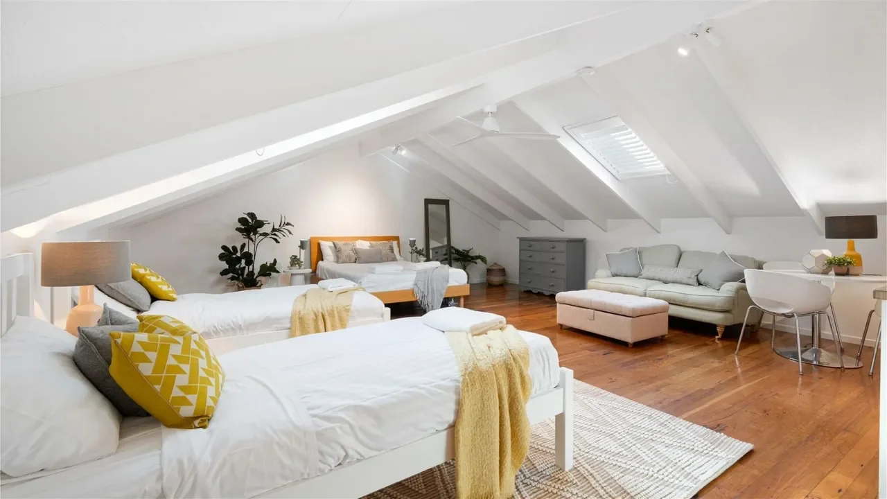 Bedroom 5 - loft, queen and 2 singles.webp