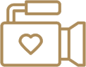 Icon of a video camera with a heart symbol on its side.