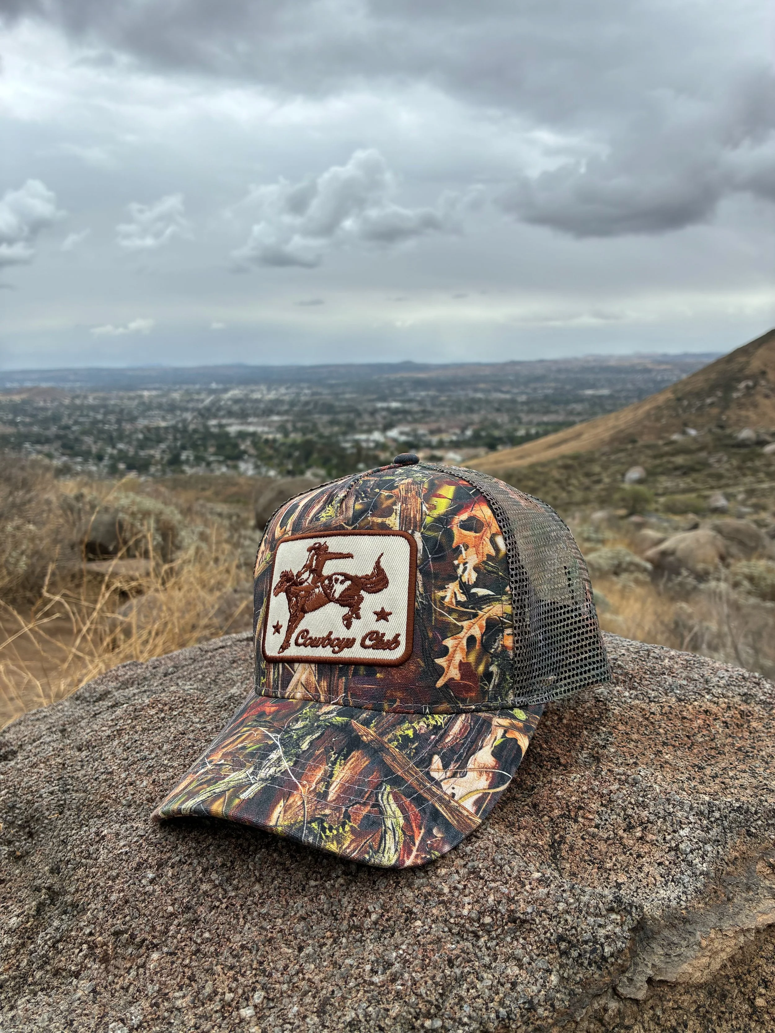 Cowboys Club Camo Trucker Hat