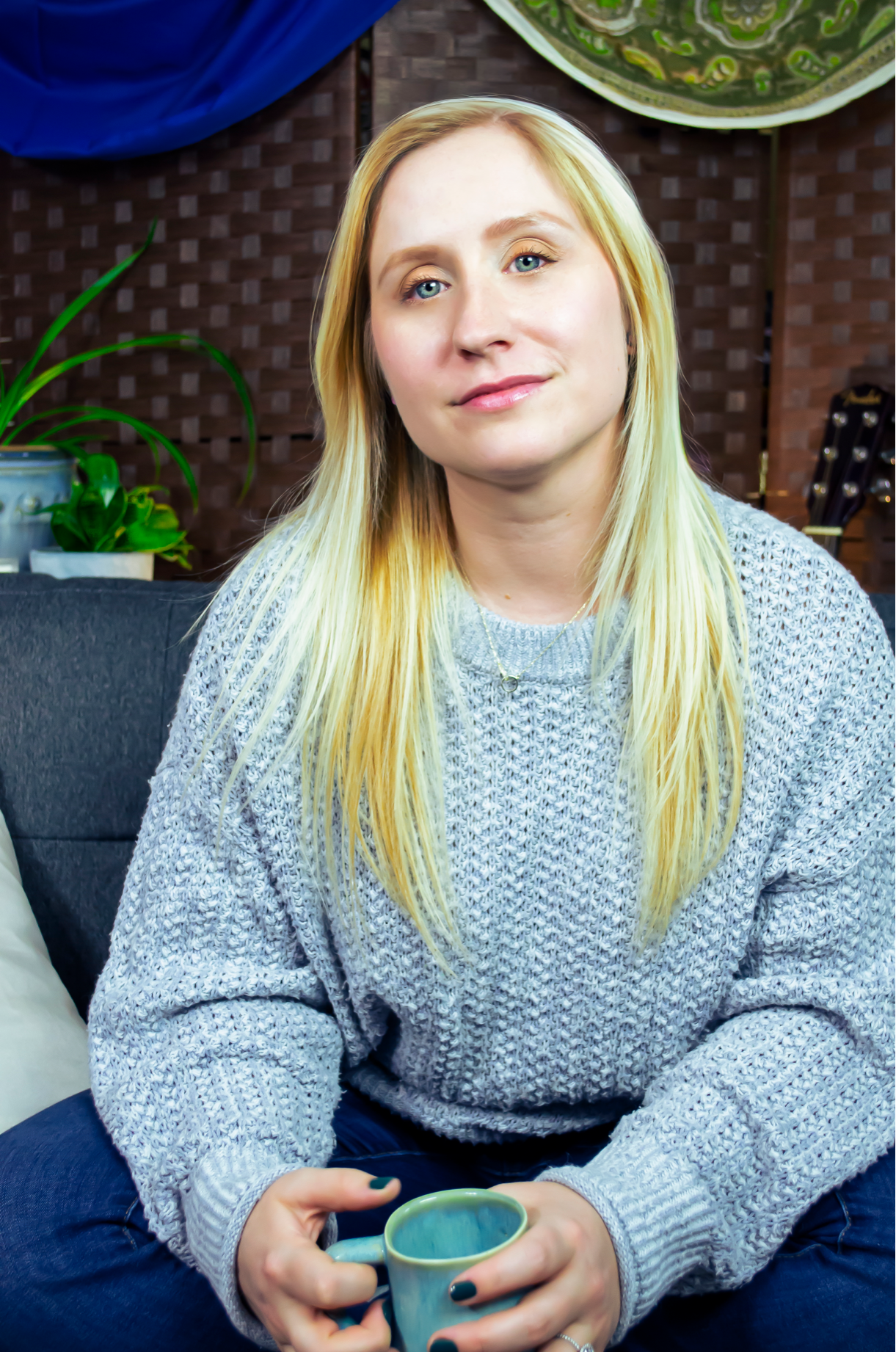 picture of woman sitting with coffee mug