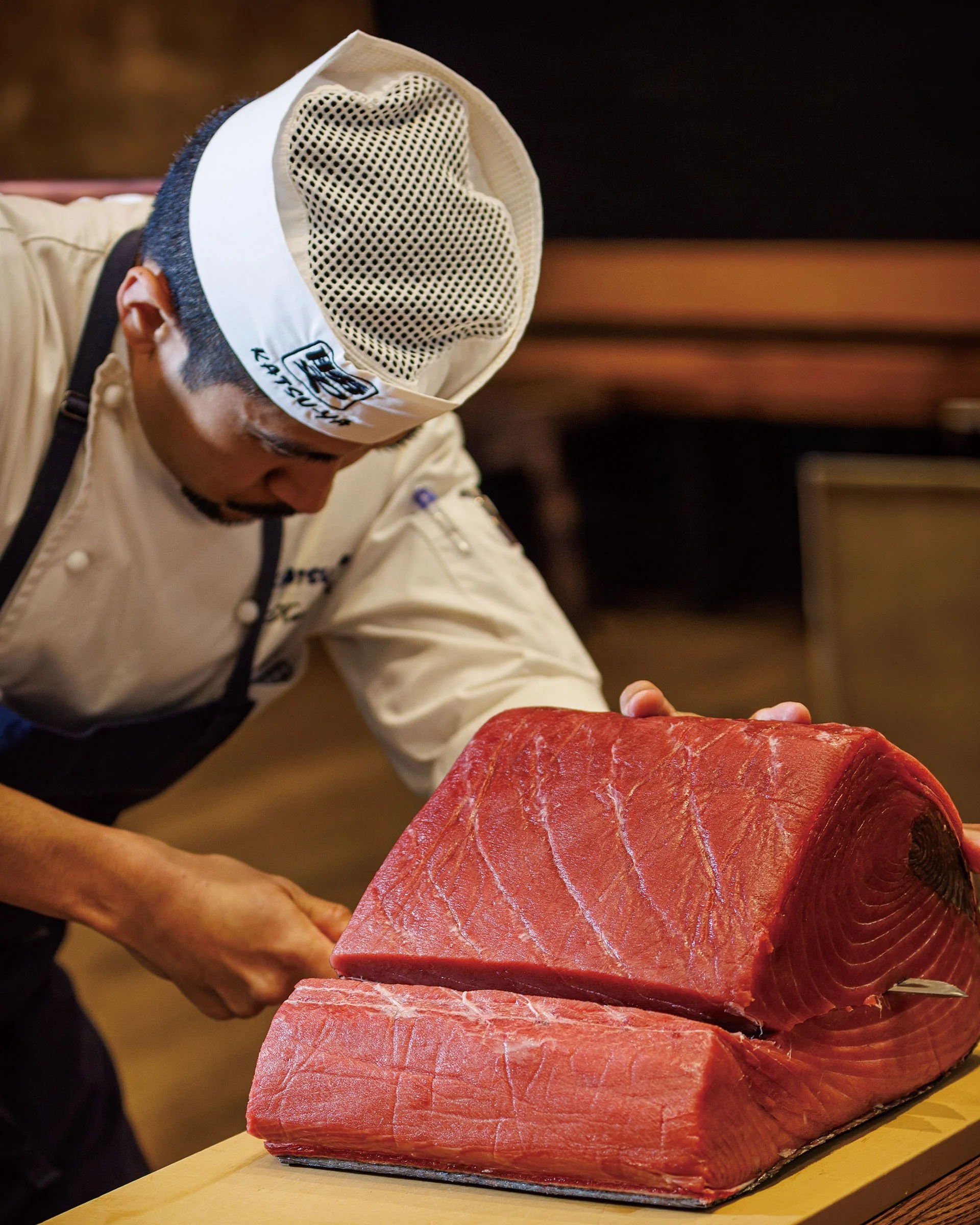Ken Uechi at Katsuya cutting up a 60 lb piece of yellowfin tuna. Sushi Yum!  #SushiLovers #StudioCity #garyrosephotography @sushirow #SushiLover #SushiAddict #SushiTime #StudioCityEats Katsu-ya Group (@katsuyagroup)