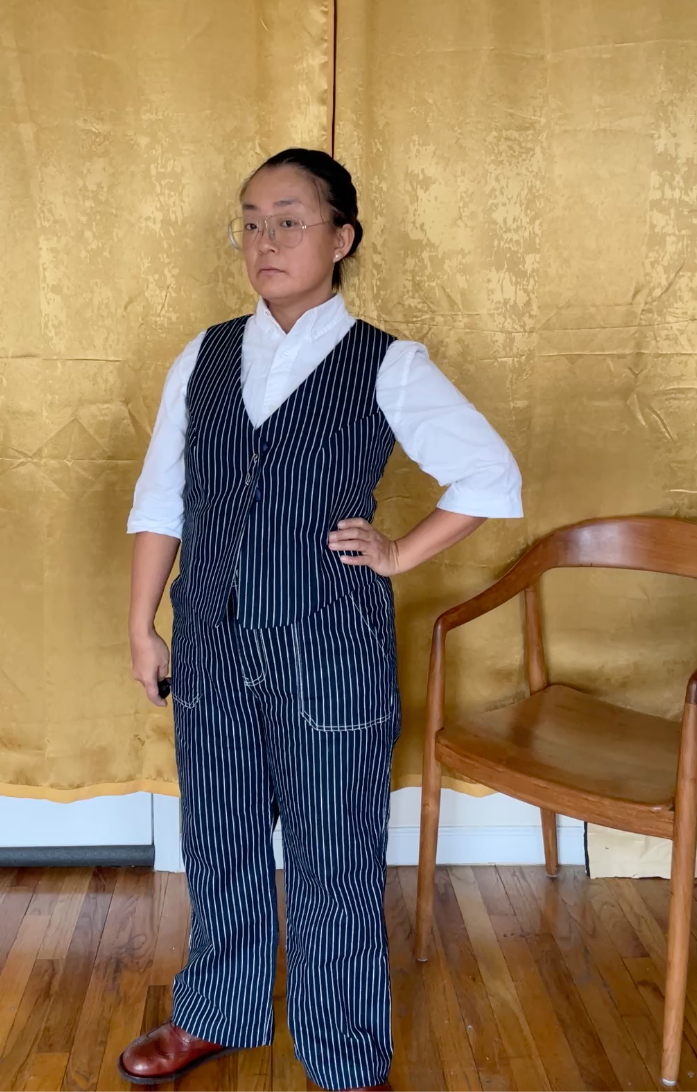 Judy with Navy Pinstripe Waistcoat cut from a pair of matching pants.