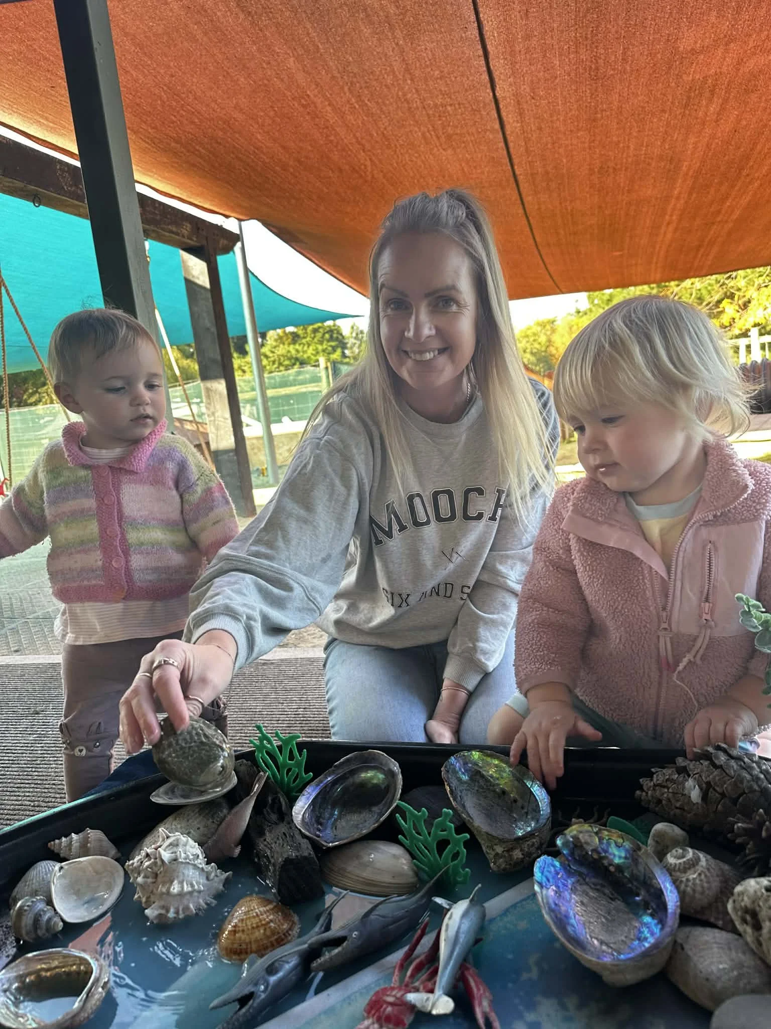 Early childhood teacher at Country Wonders childcare centre supporting children in Loburn near Rangiora