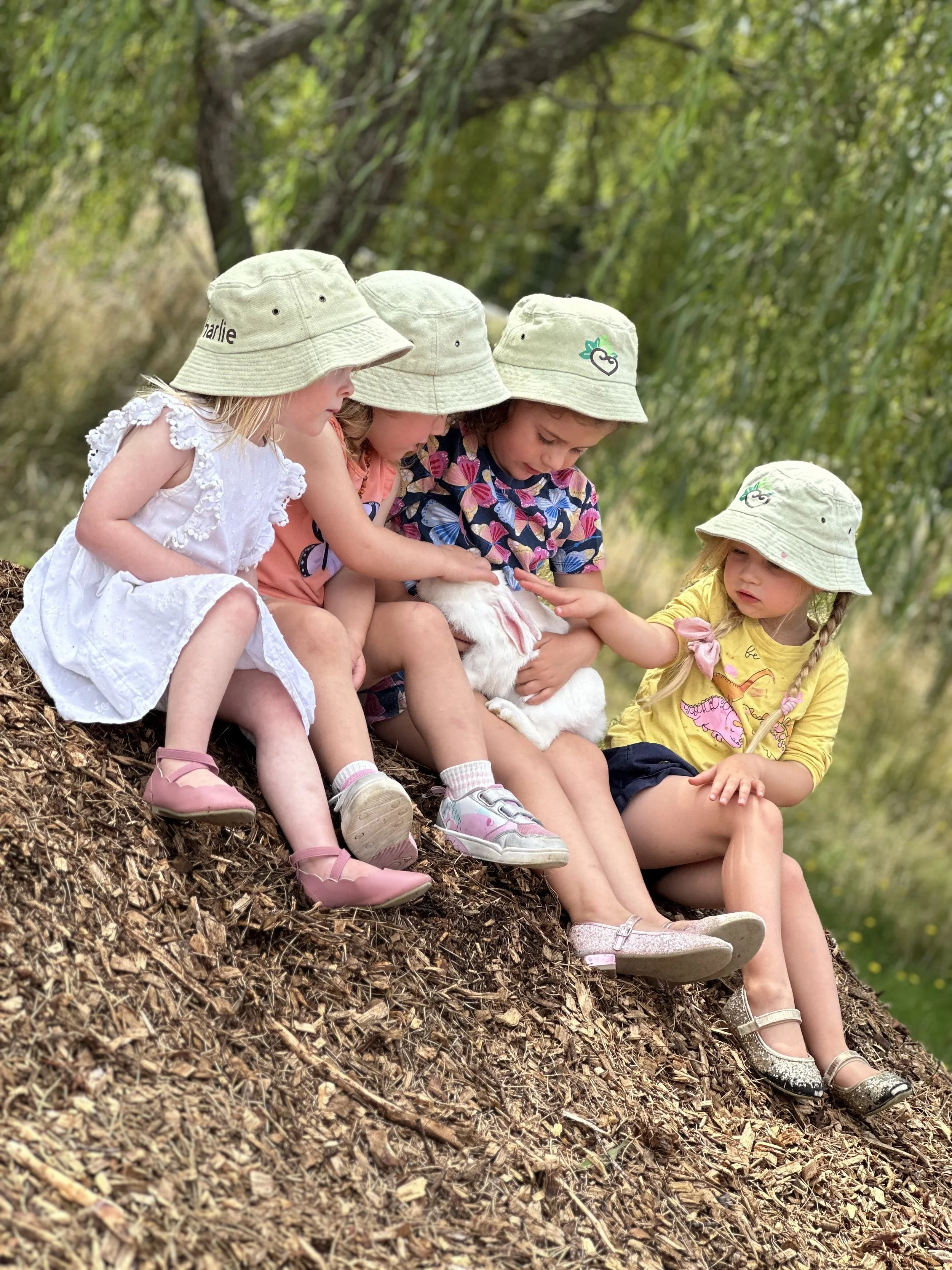 Kids playing outside at Country Wonders preschool in Loburn near Rangiora
