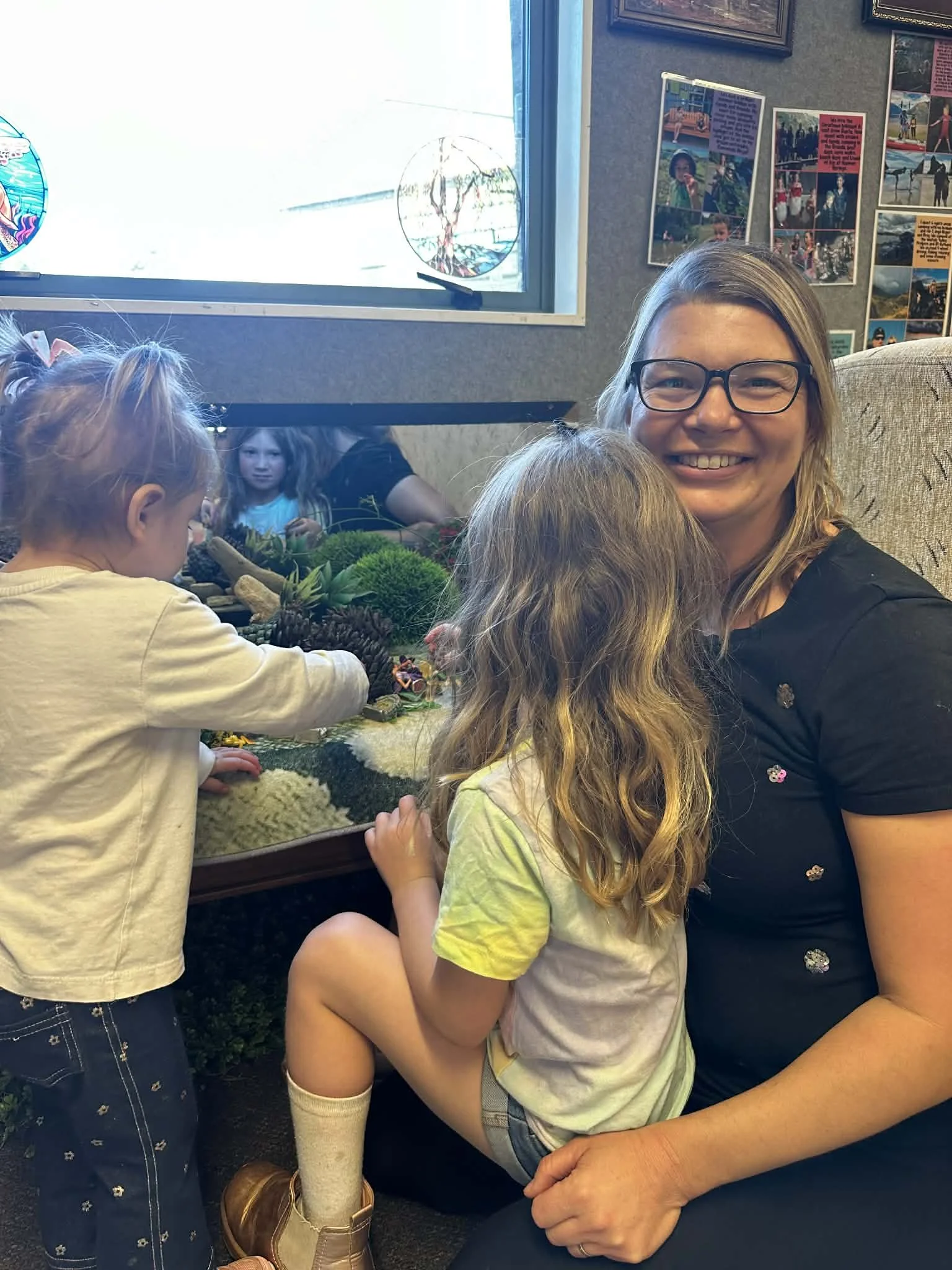 Early childhood teacher at Country Wonders childcare centre supporting children in Loburn near Rangiora