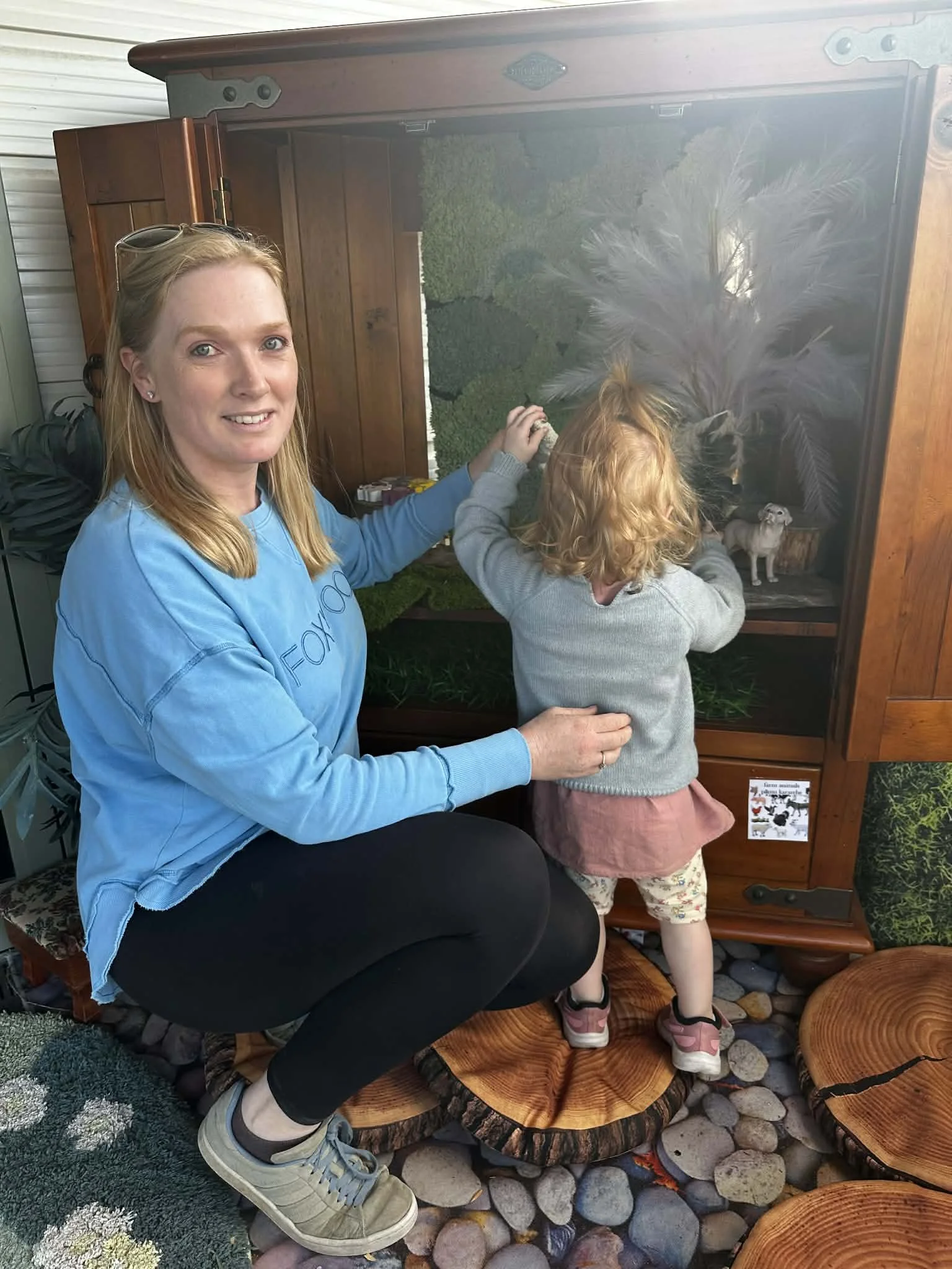 Early childhood teacher at Country Wonders childcare centre supporting children in Loburn near Rangiora