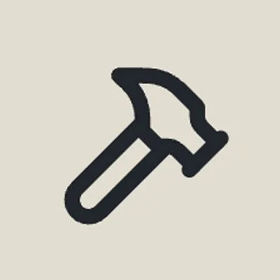 Simplified icon of a hammer.