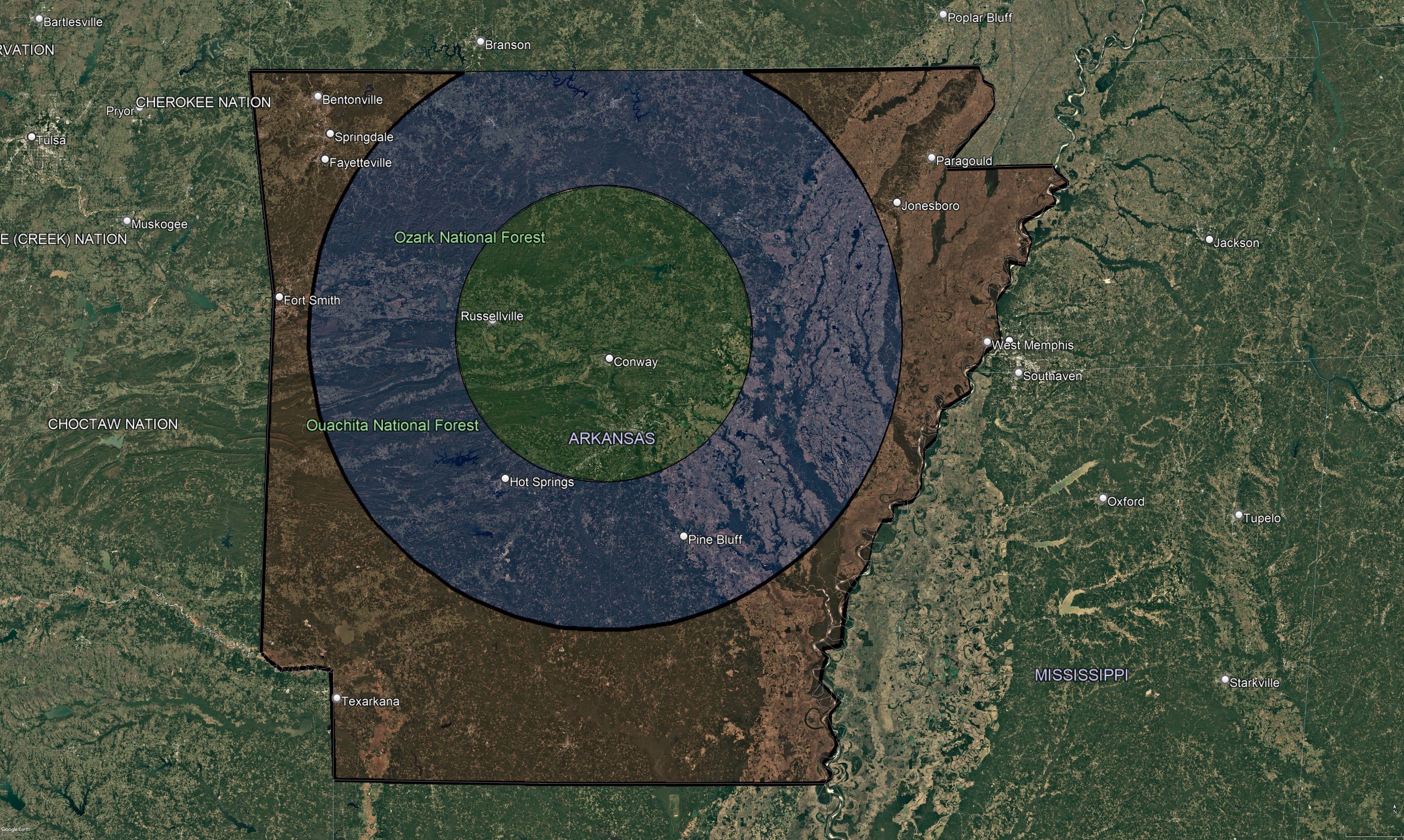 Satellite map showing Arkansas with highlighted area indicating the Ozark National Forest and Ouachita National Forest, including nearby towns and borders.