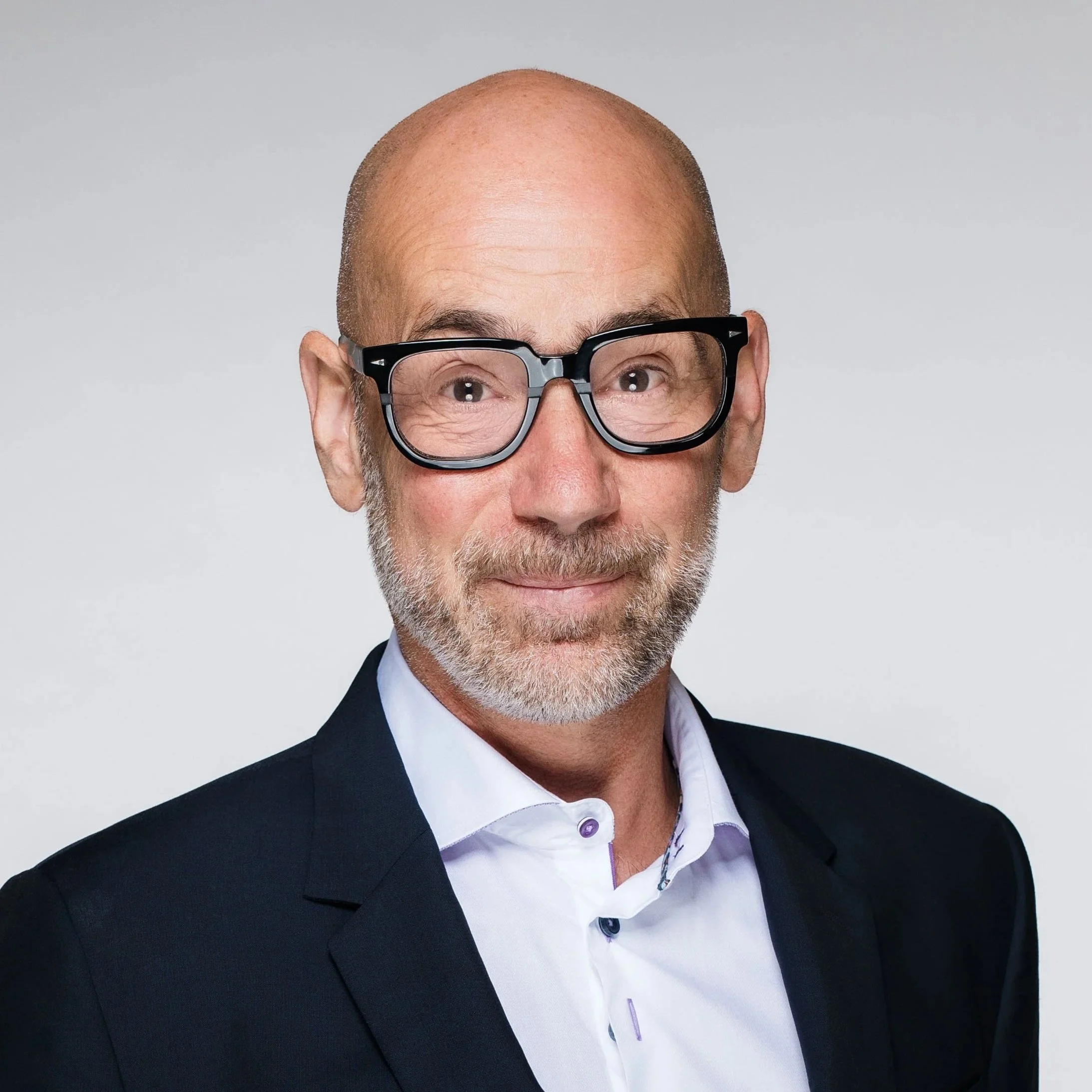 Headshot of CEO, Blair Glubb.