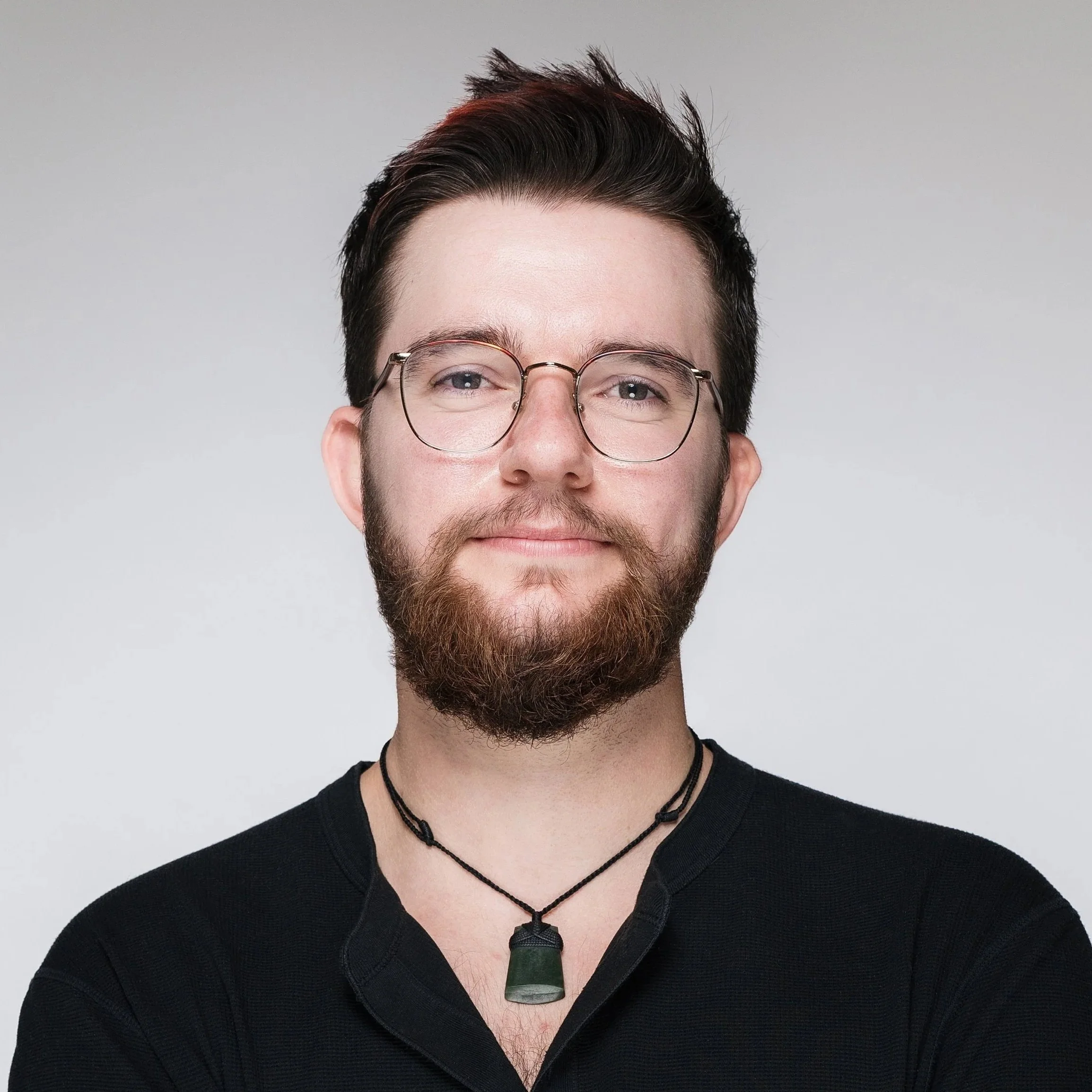 Headshot of Graphic Designer, Theo Press.