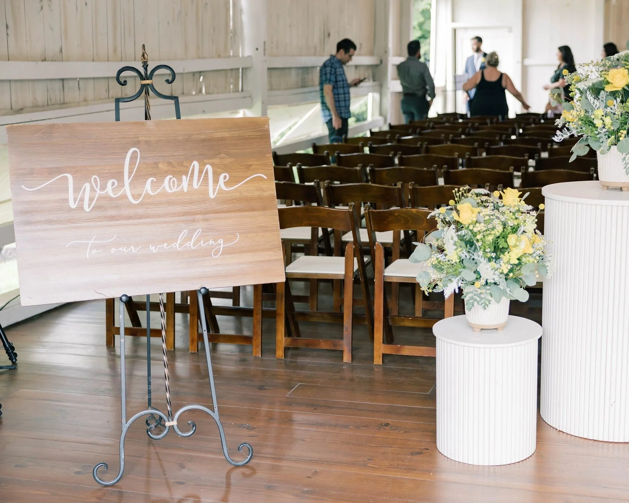 Wooden Welcome Sign on Metal Easel