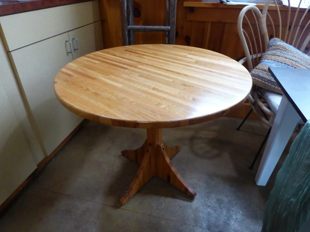 Round Natural Wood Pedestal Table
