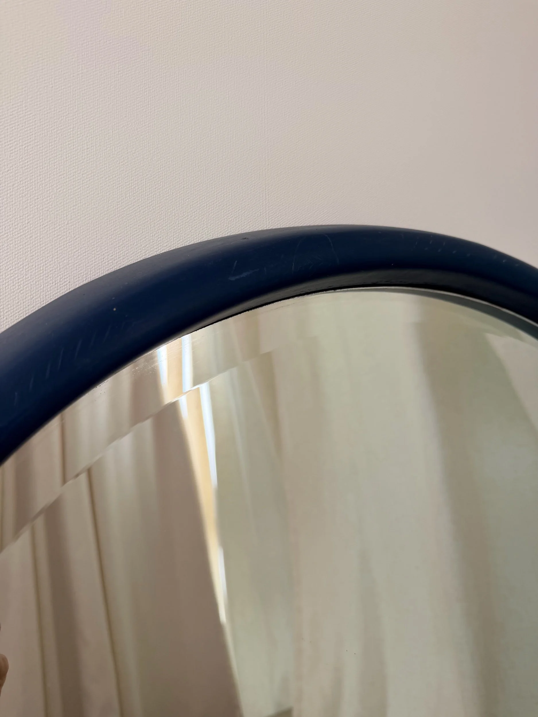 oval blue beveled mirror