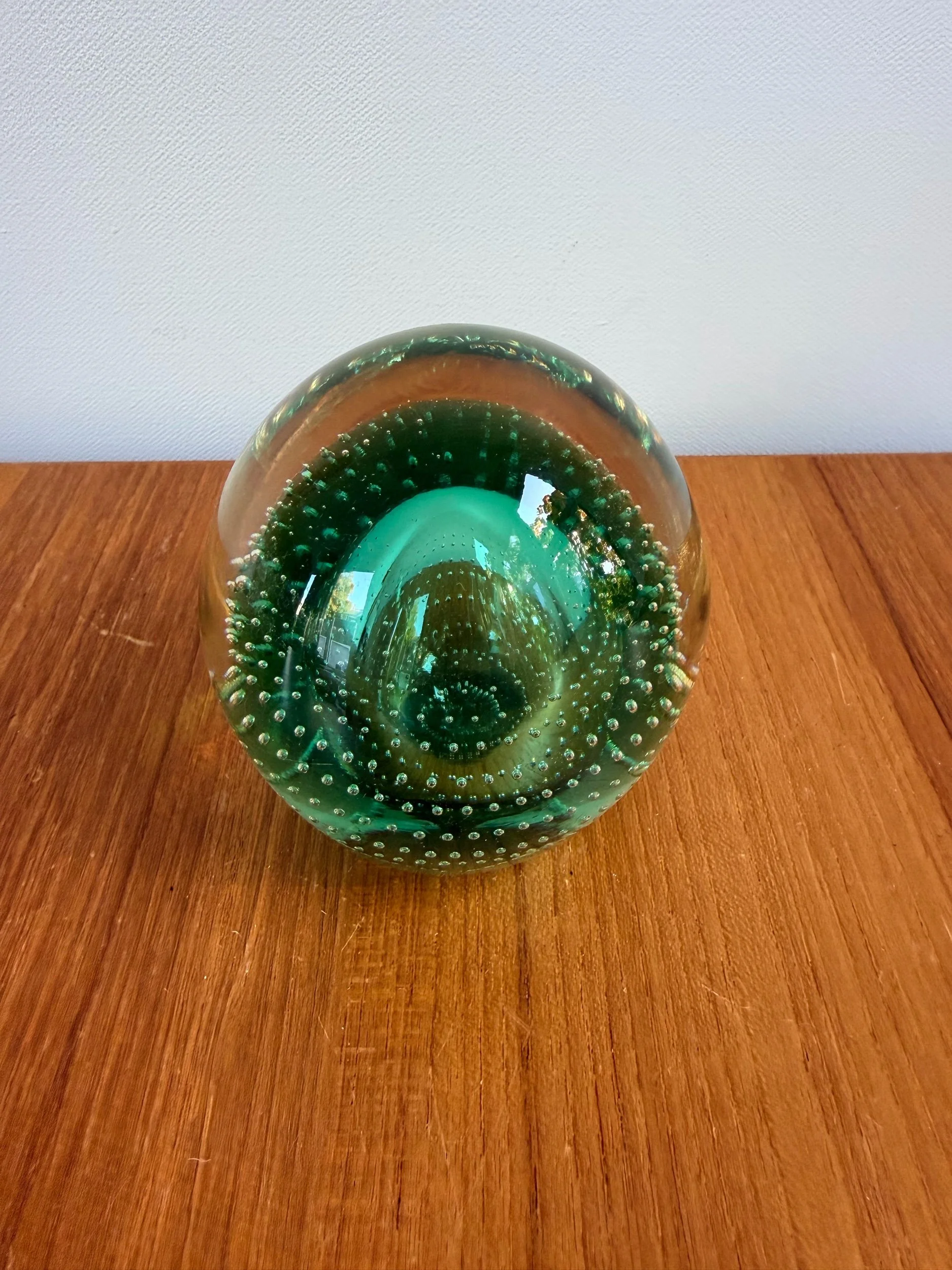 green glass paperweight