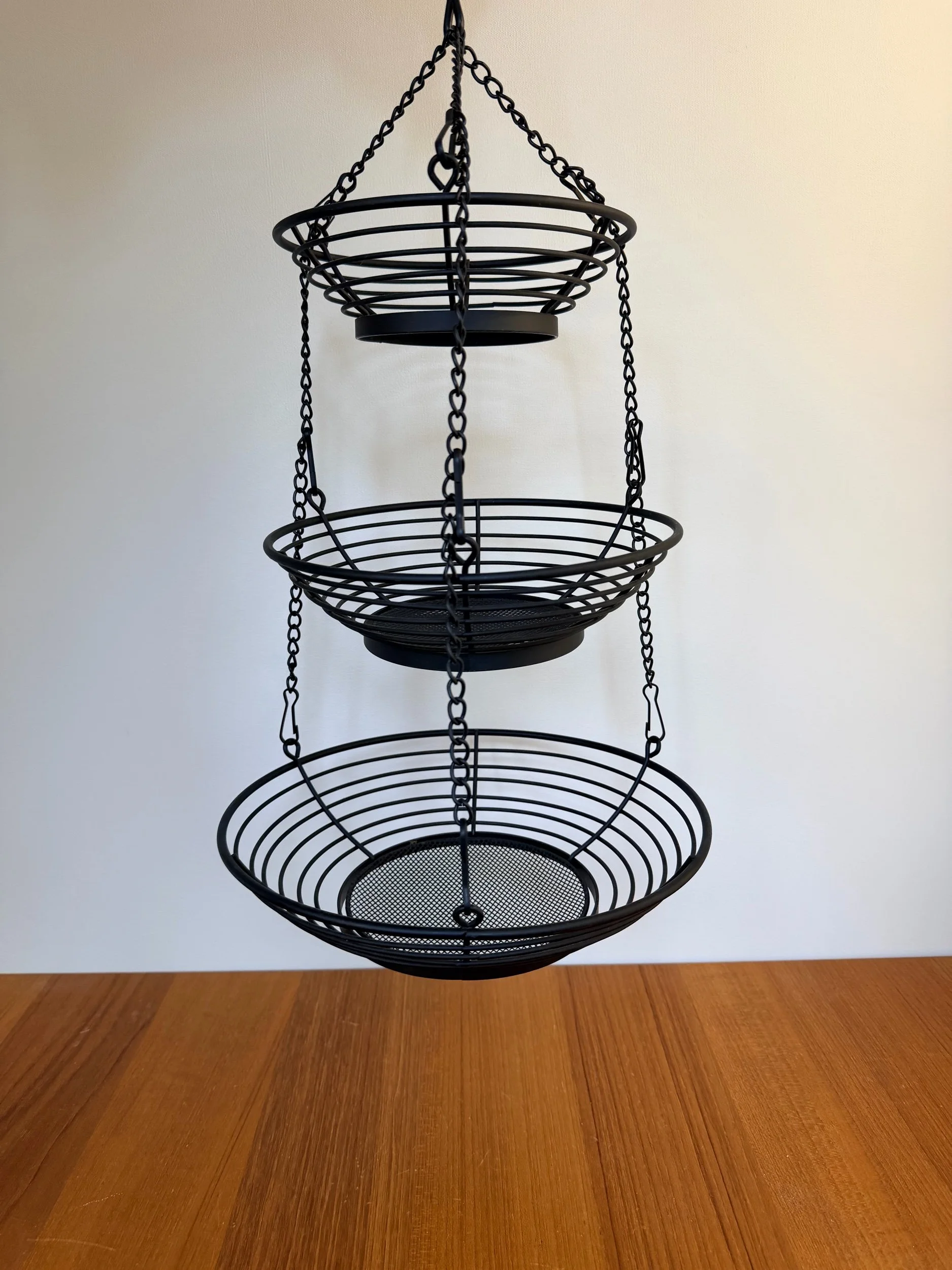 black metal hanging basket