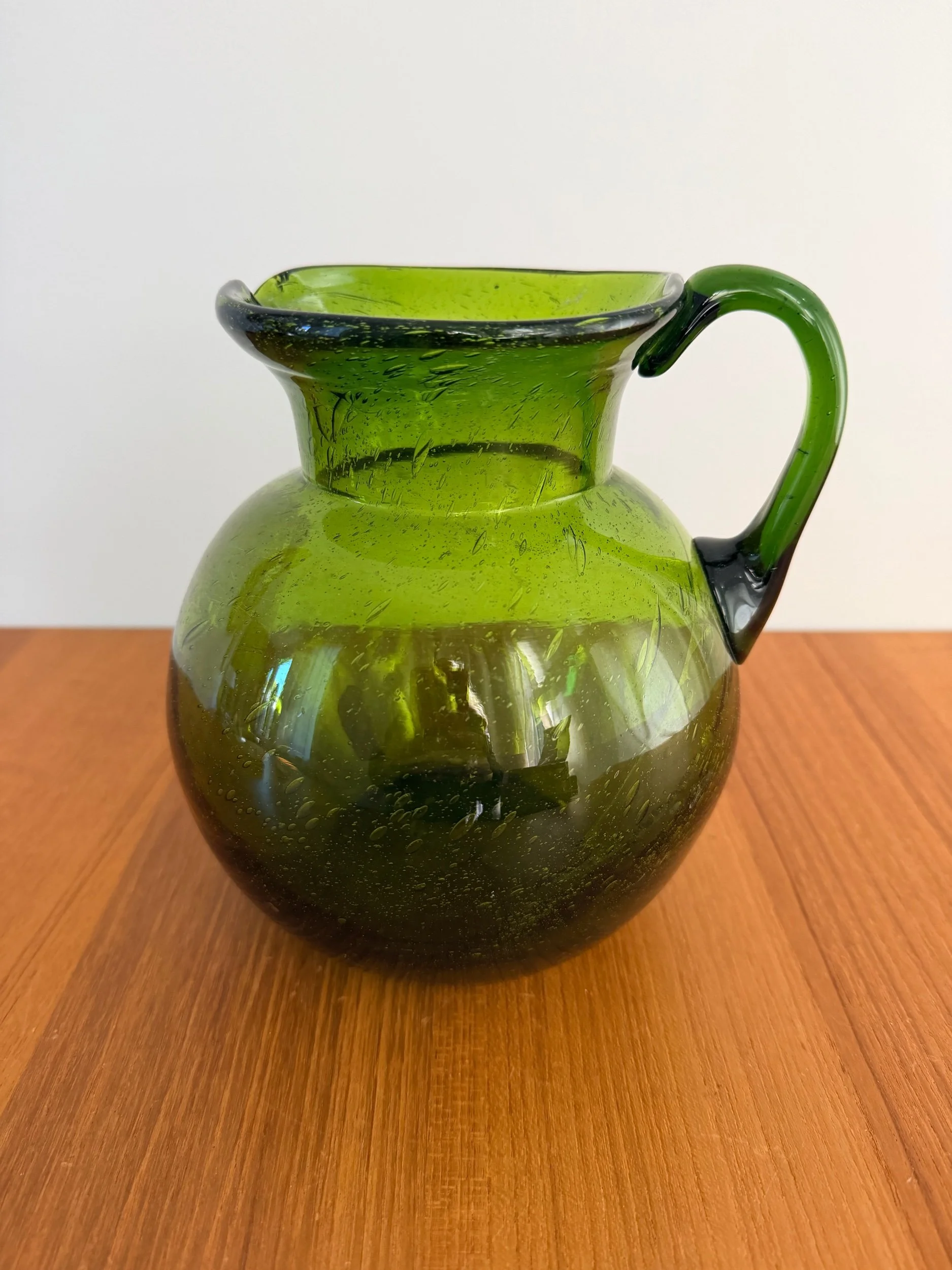 green glass pitcher