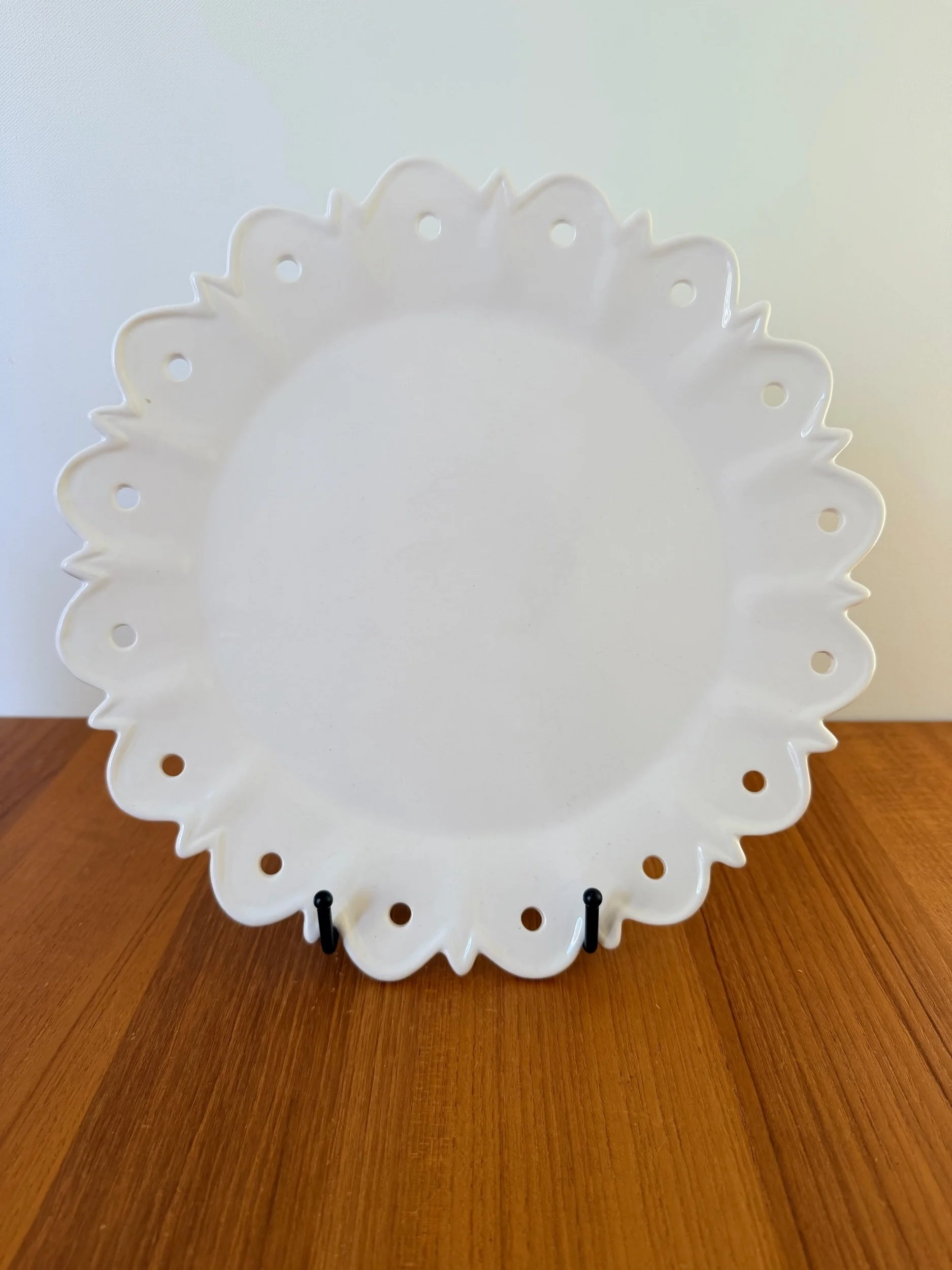 white platter with holes