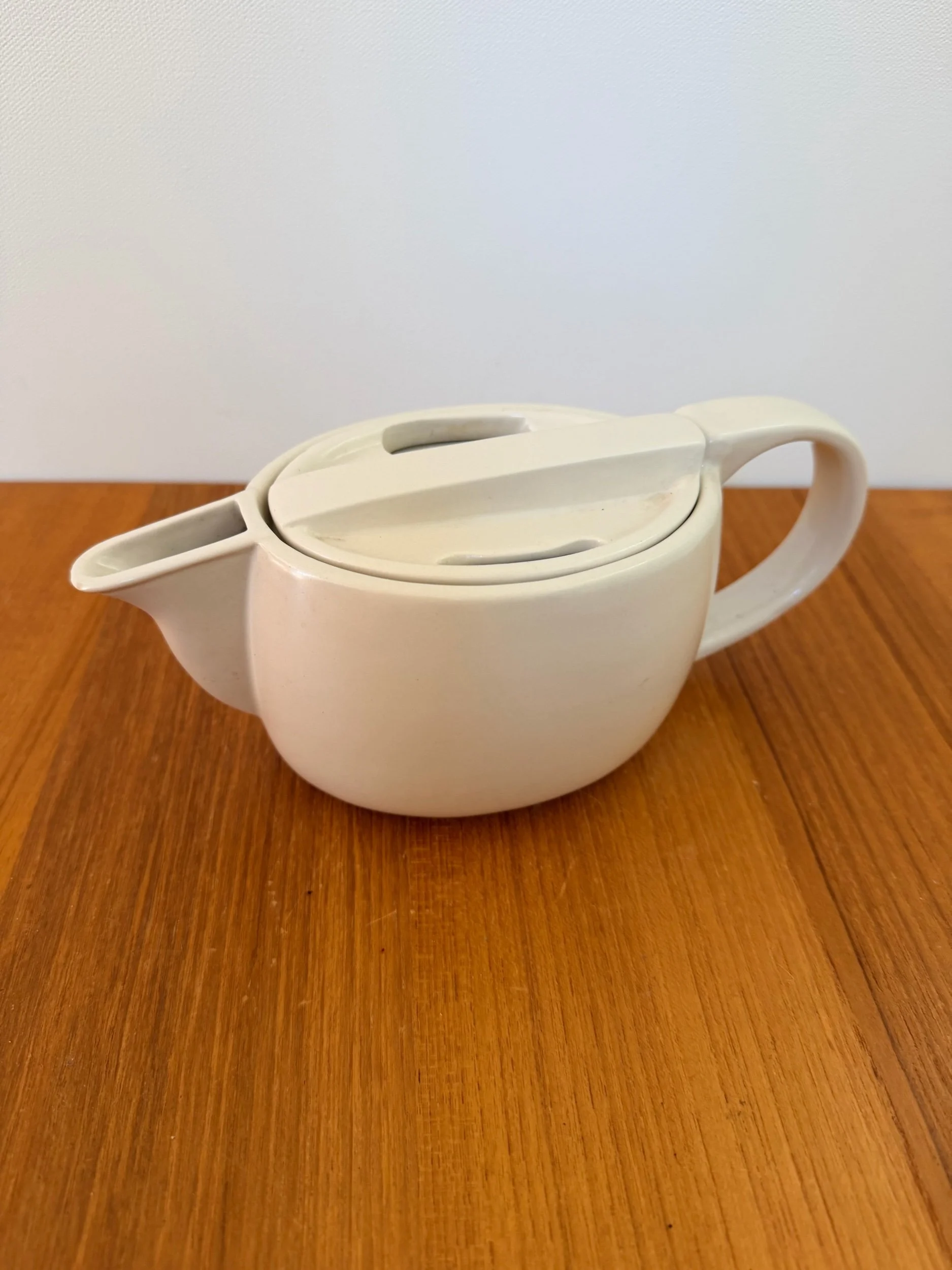 cream ceramic teapot