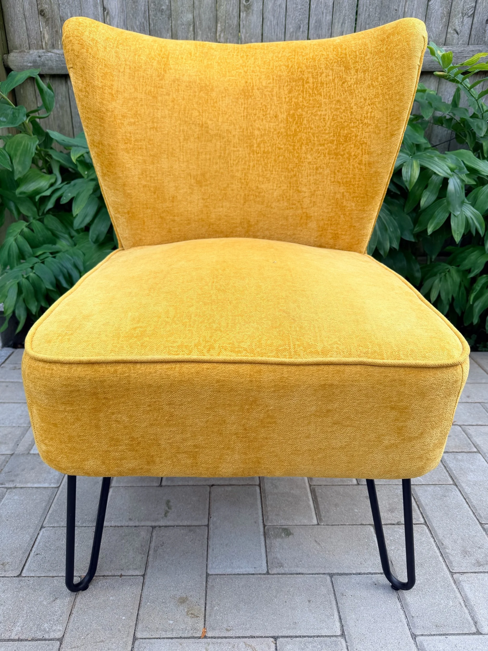 yellow upholstered chair