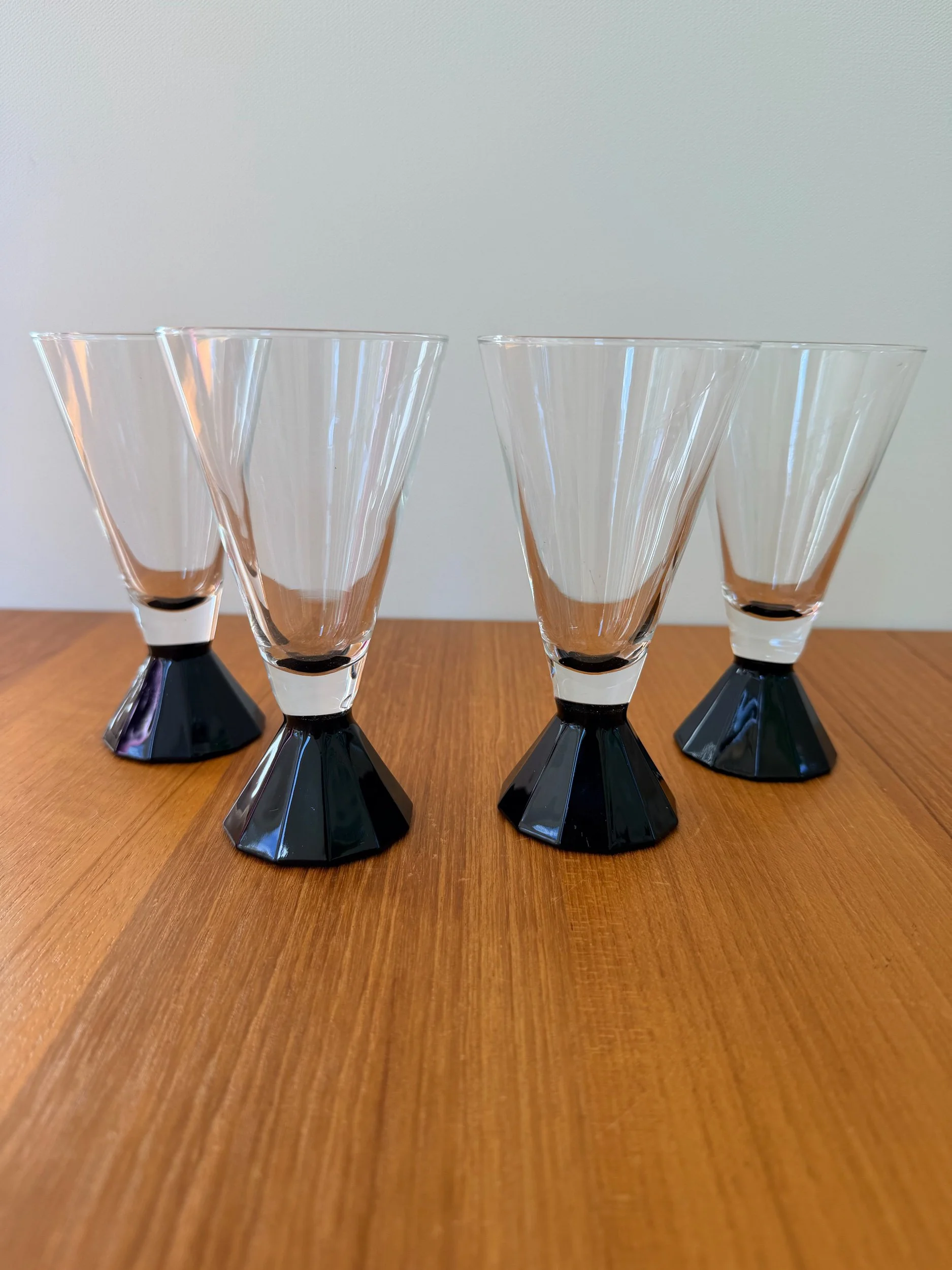 4 black base glass cordials