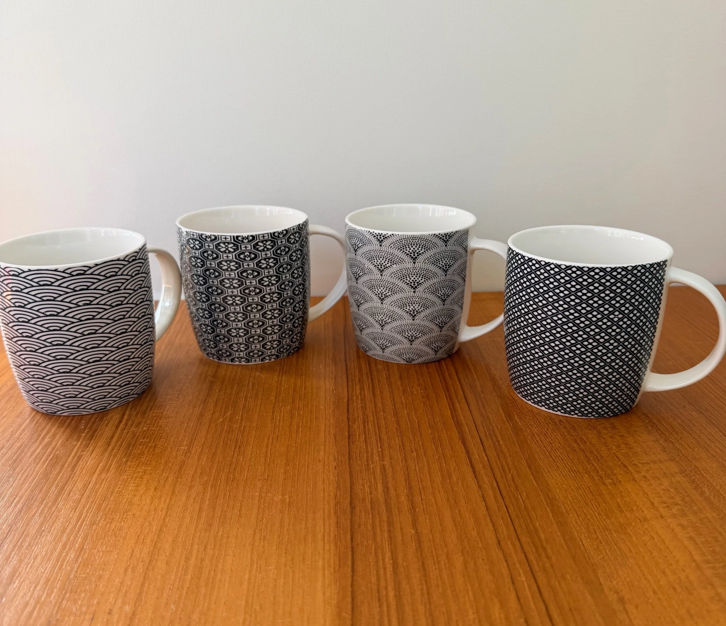 4 black & white variety mugs
