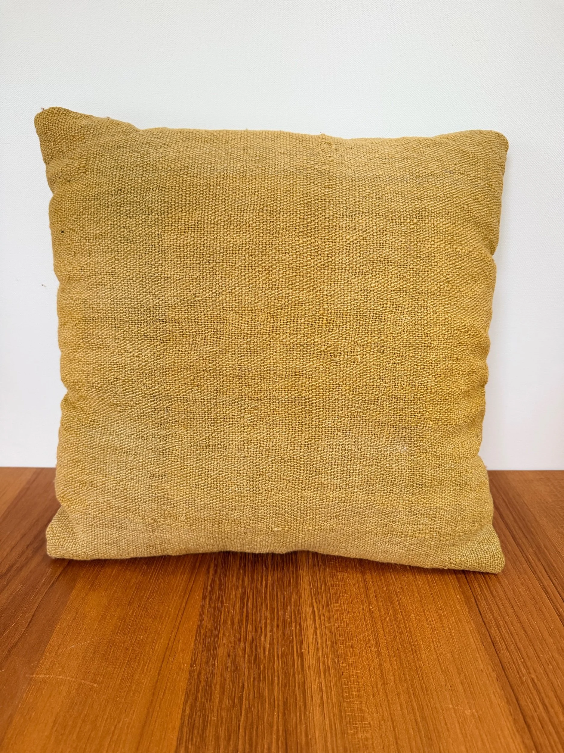 Green textured wool pillow
